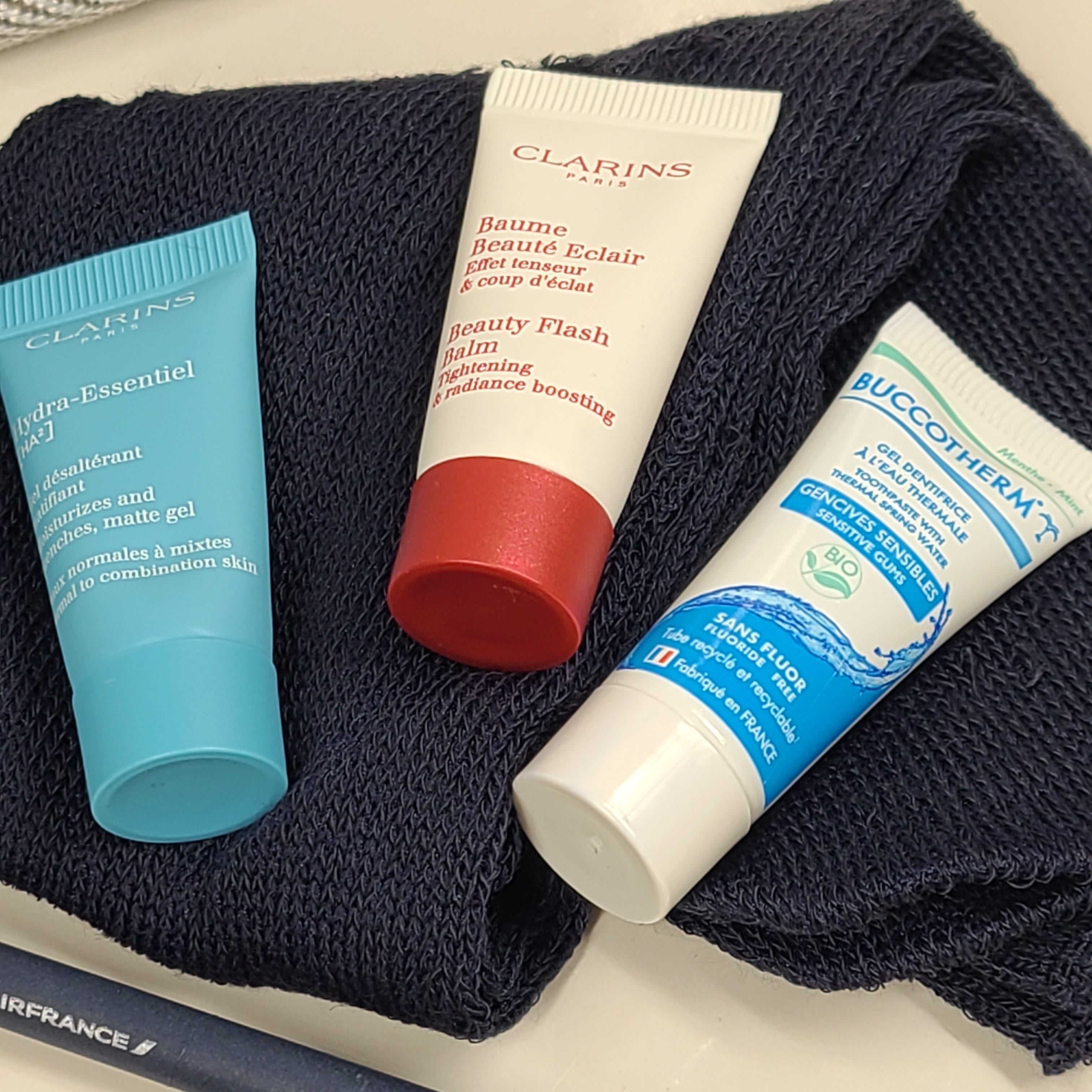 A luxurious Air France Travel Amenity Kit with Clarins skincare products