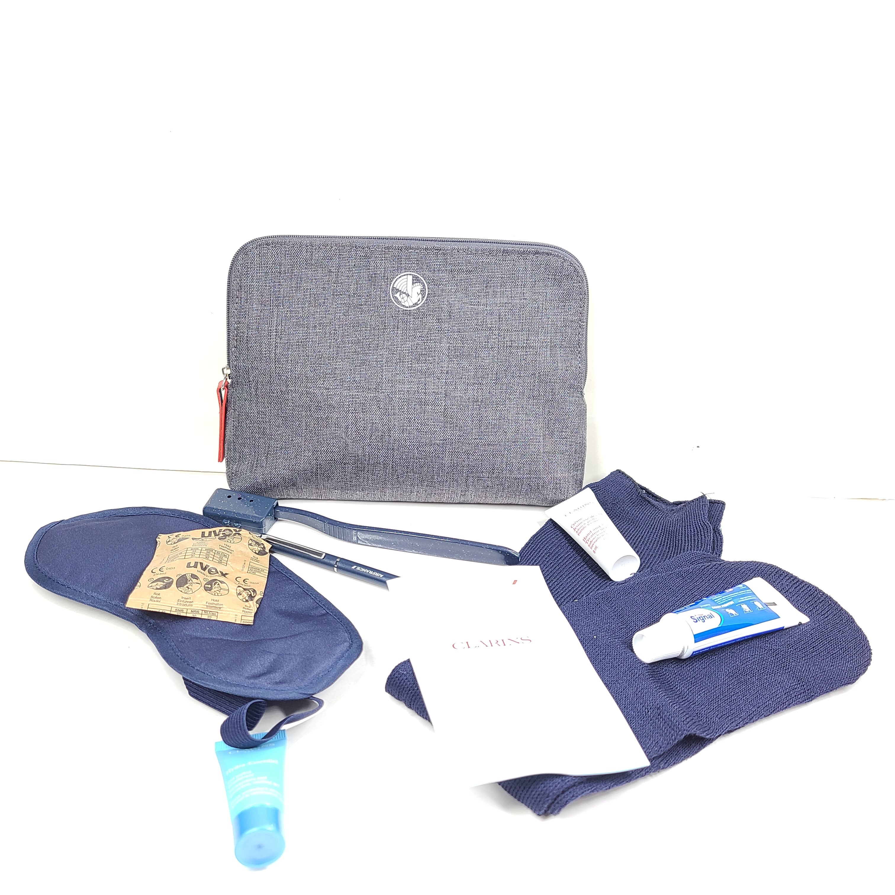 A travel kit with Clarins skincare products and Air France branding