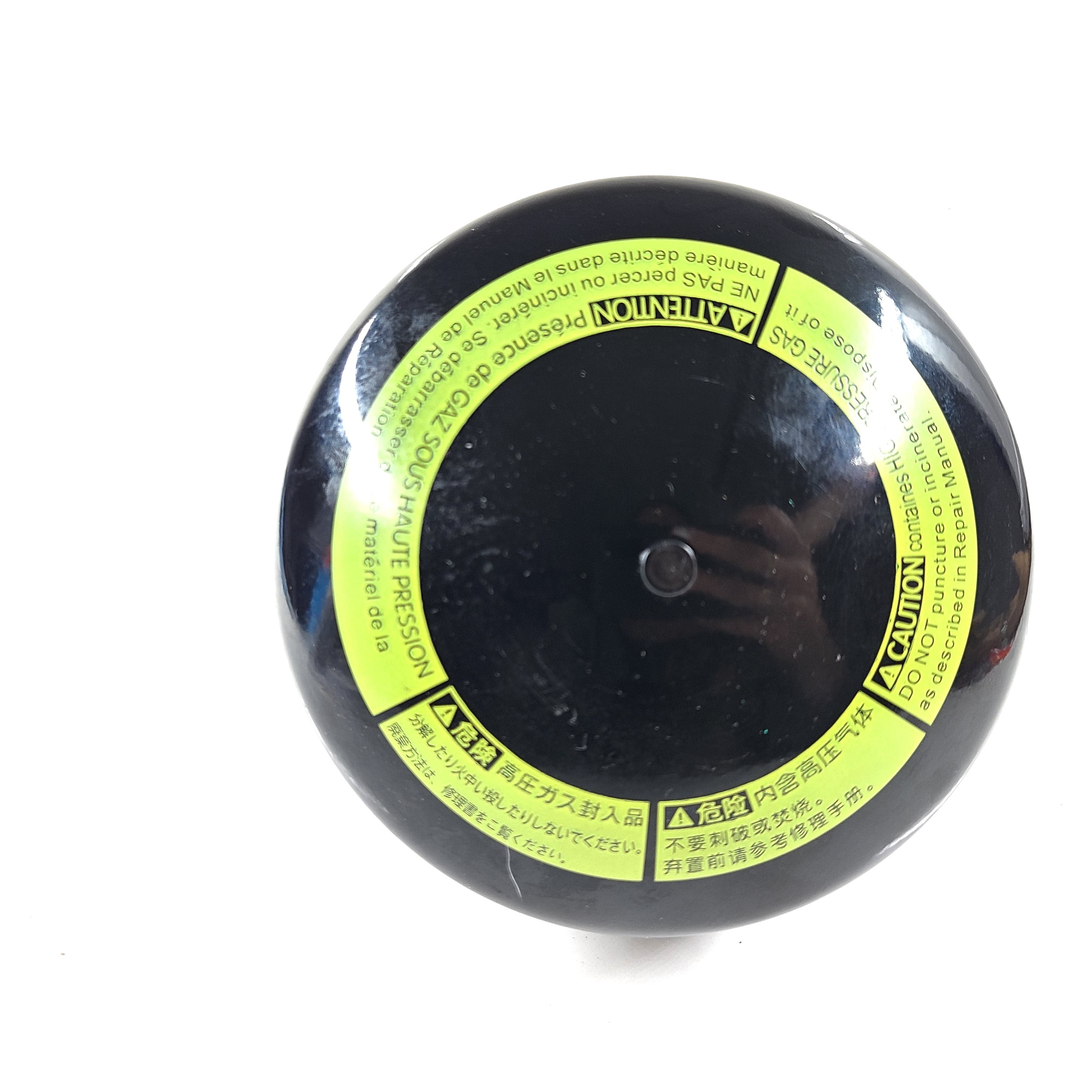 A high-pressure gas cylinder with caution label