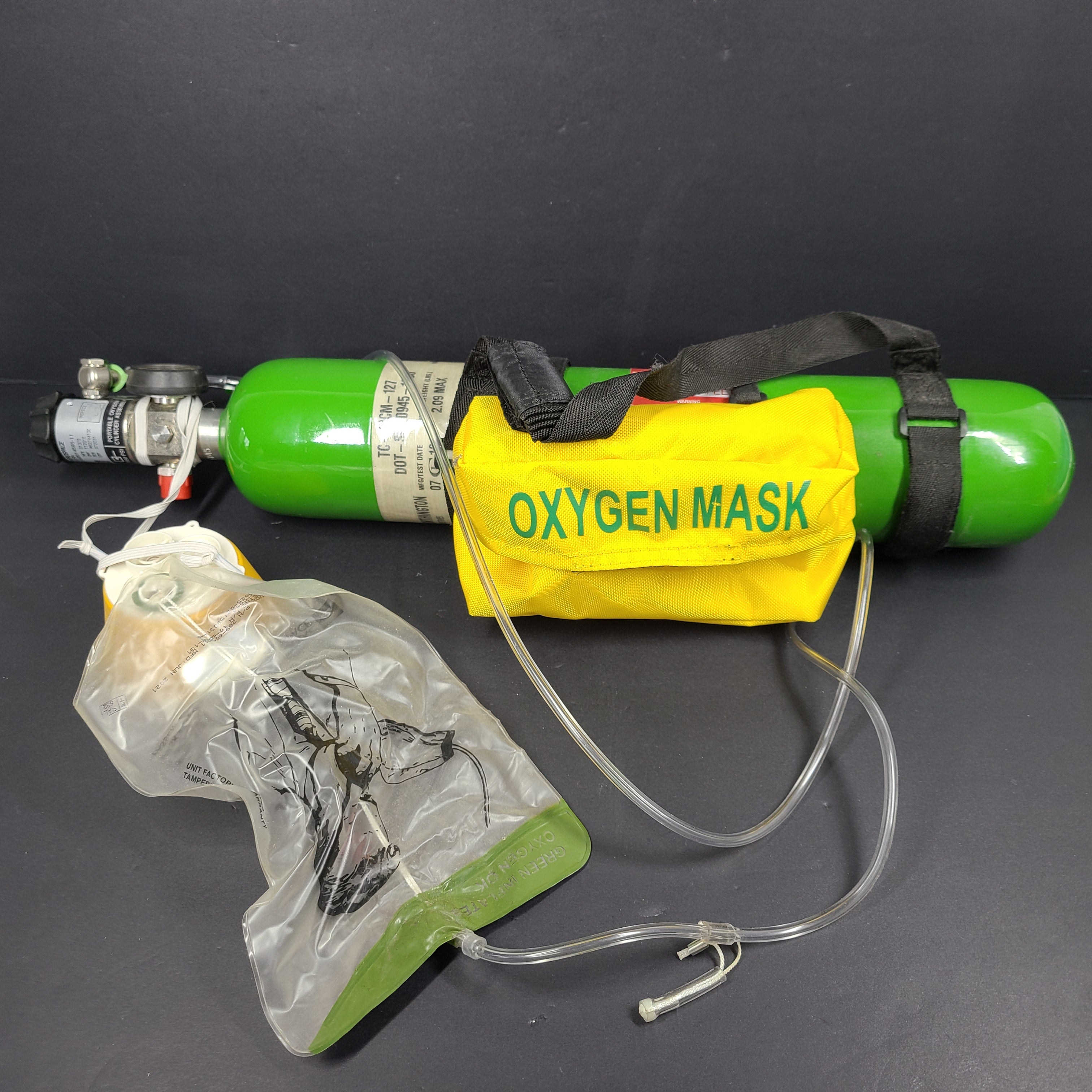 Lightweight portable oxygen cylinder assembly with mask