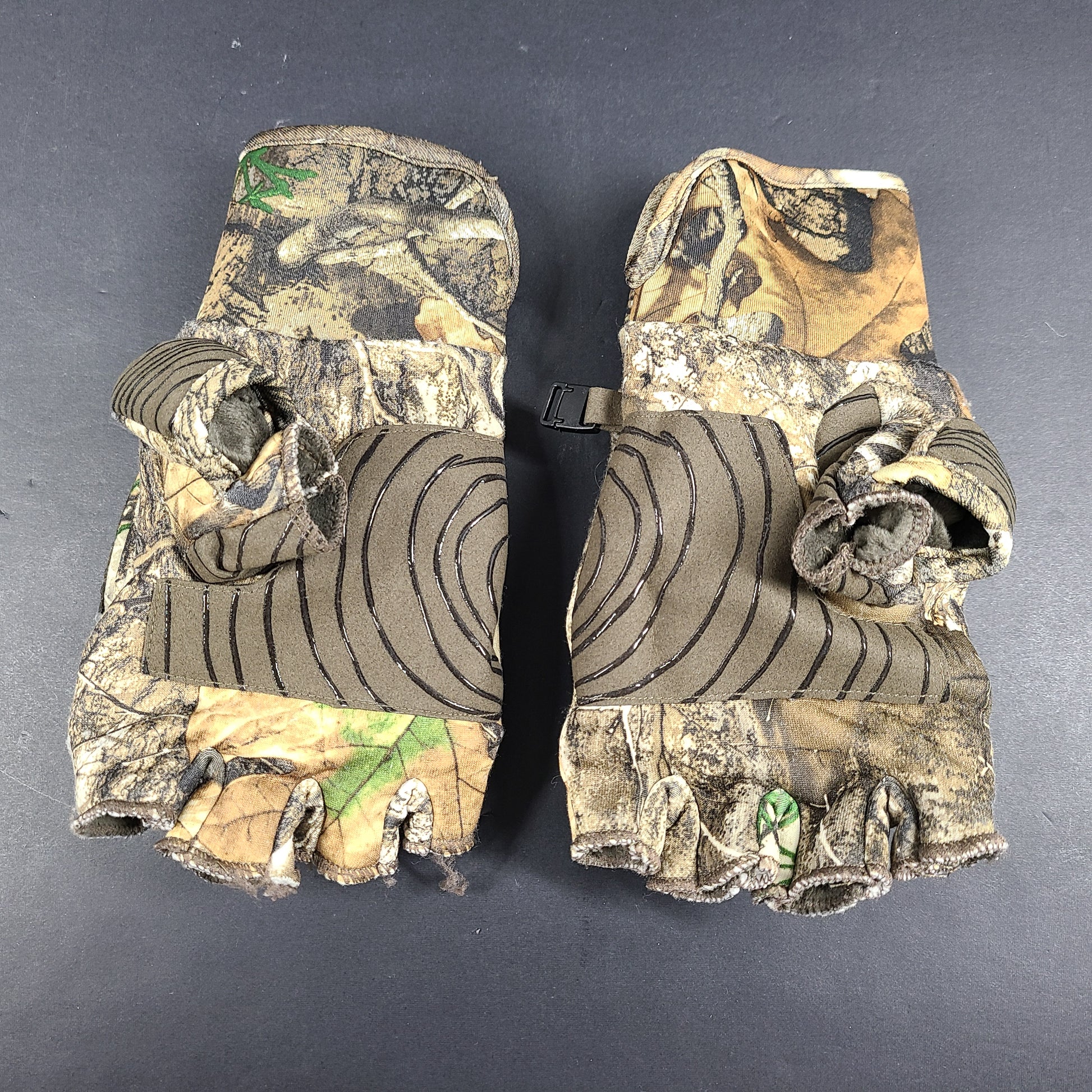 Realtree Camouflage fingerless gloves suitable for hunting and fishing activities.