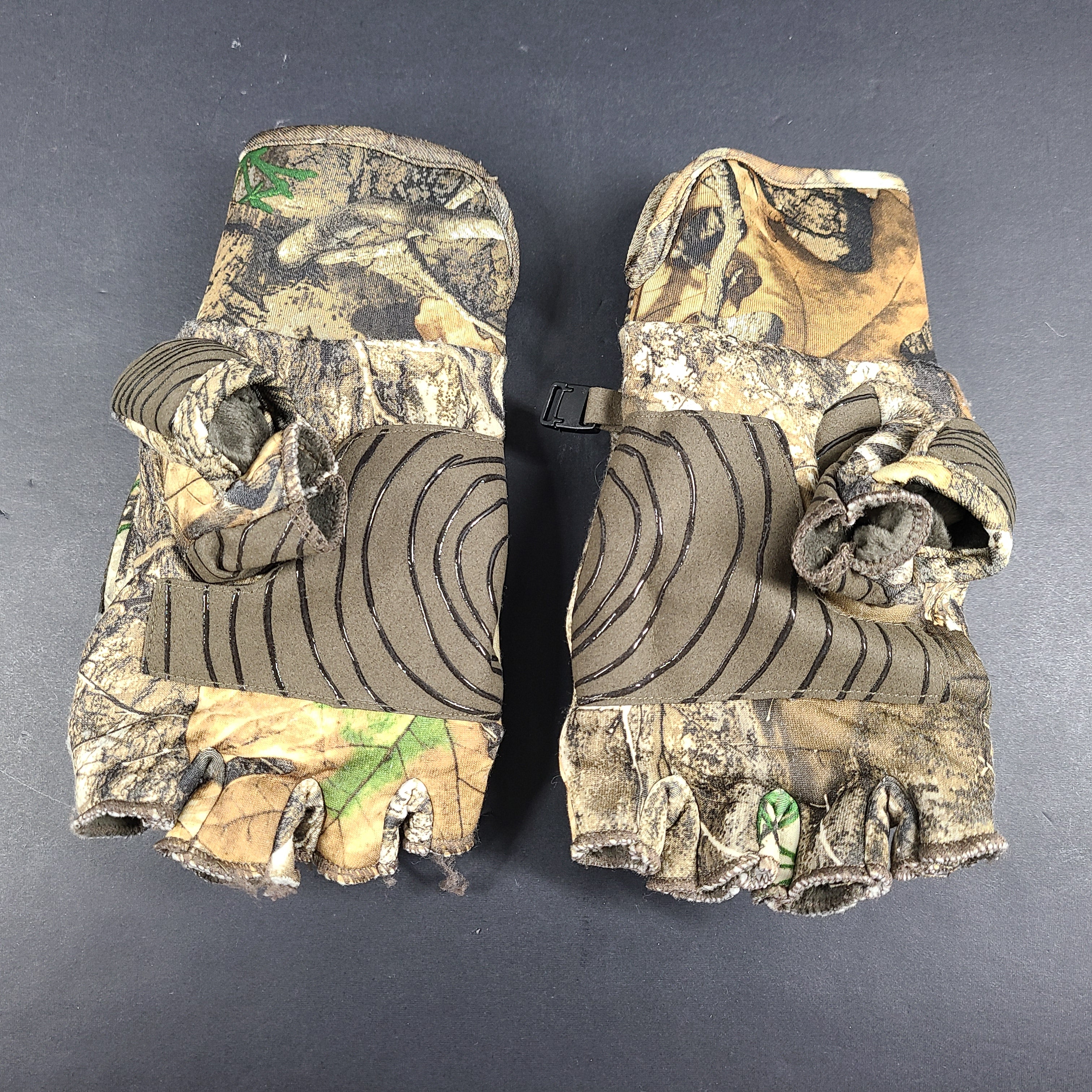 Realtree Camouflage fingerless gloves suitable for hunting and fishing activities.