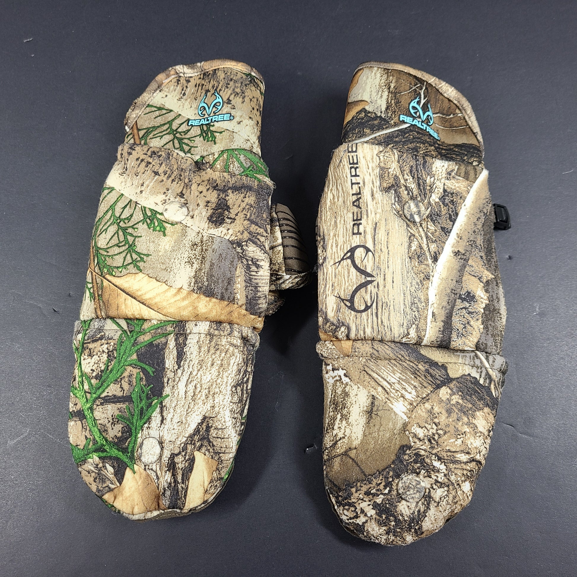 Realtree Camouflage fingerless gloves suitable for hunting and fishing activities.