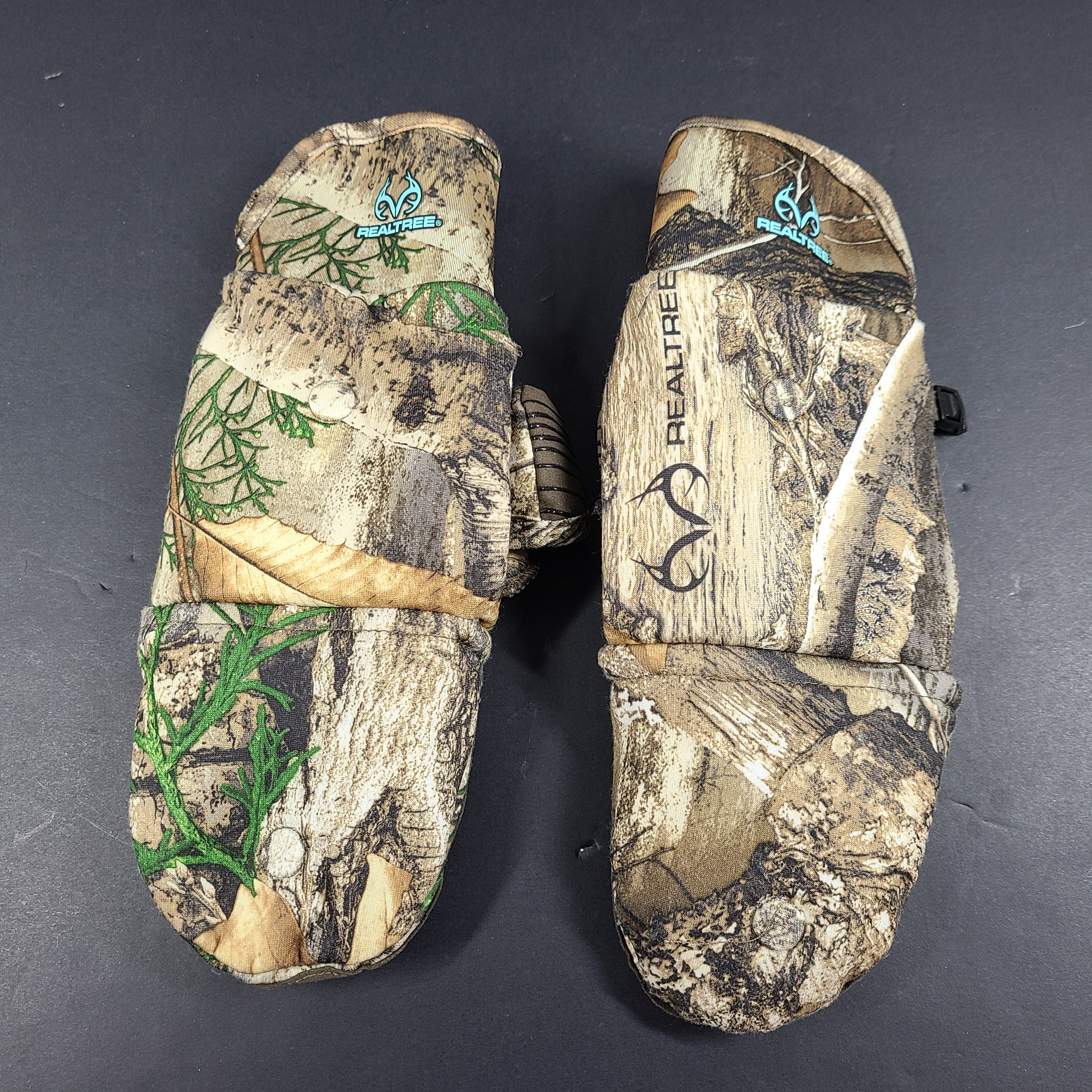 Realtree Camouflage fingerless gloves suitable for hunting and fishing activities.