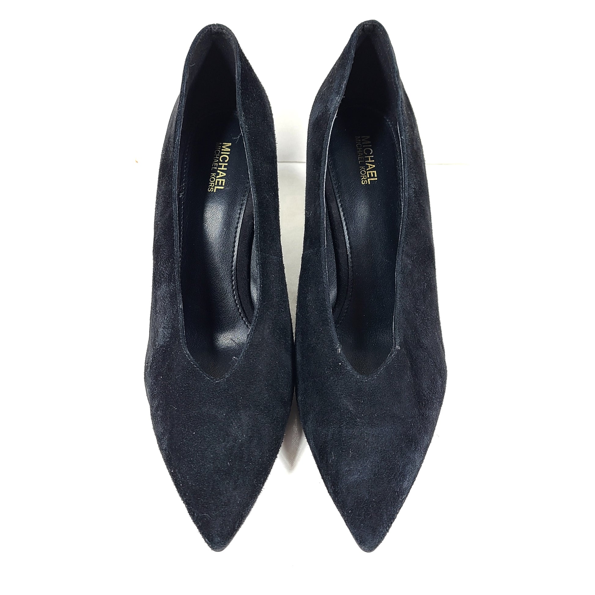 A pair of black suede Michael Kors women's heels with pointed toes, size 8.5M