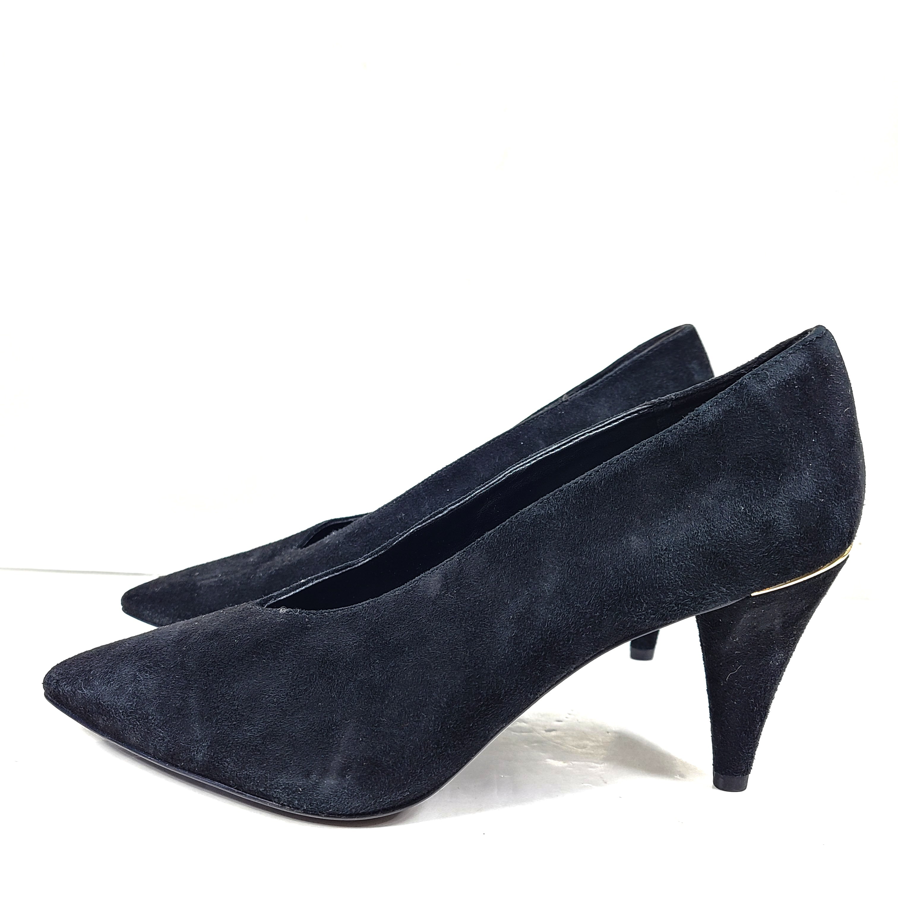 A pair of black suede Michael Kors women's heels with pointed toes, size 8.5M