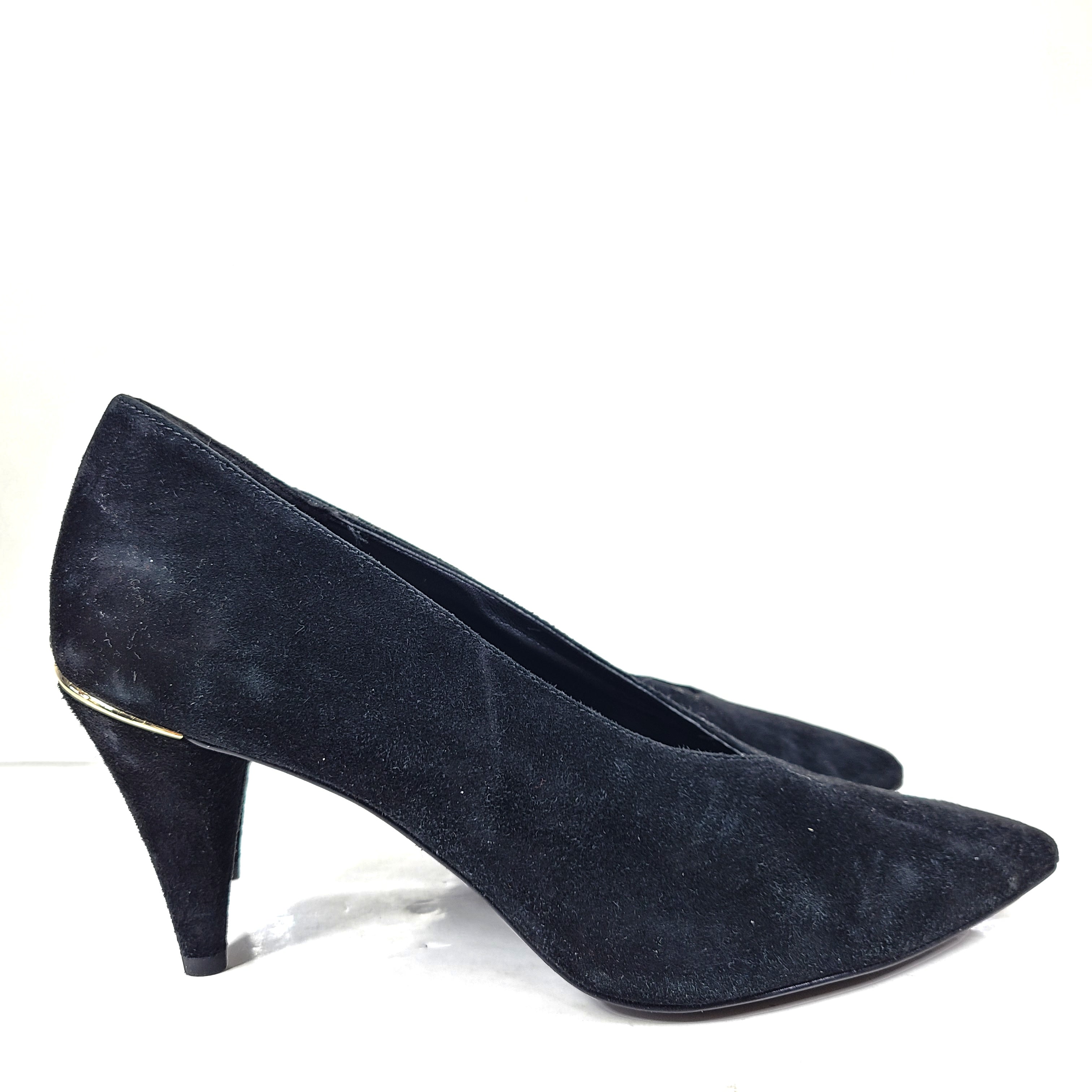 A pair of black suede Michael Kors women's heels with pointed toes, size 8.5M