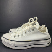A pair of white Converse Chuck Taylor All Star Low Top sneakers in size 4.5