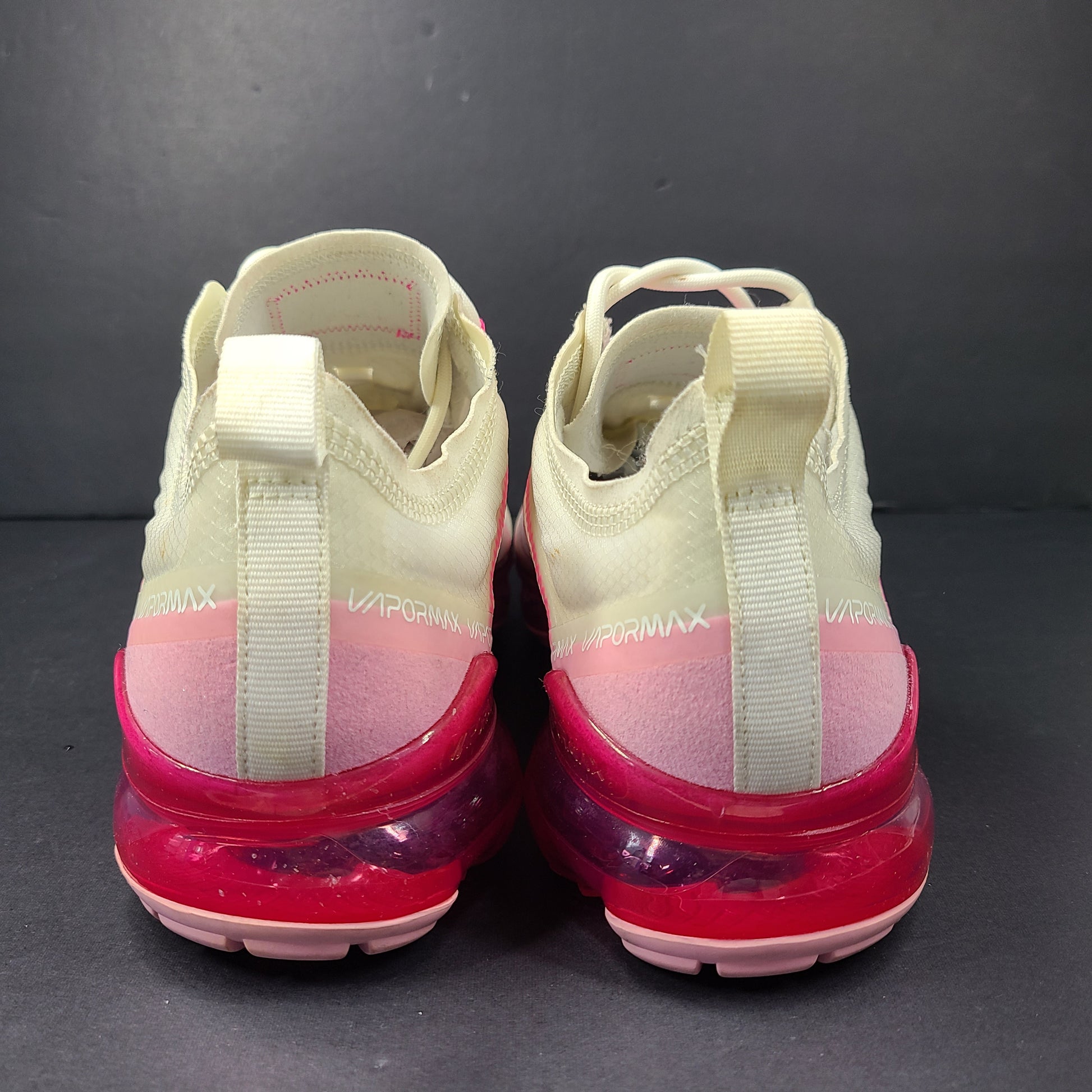Pink and white Nike Air VaporMax 2019 women's sneakers in US size 10.