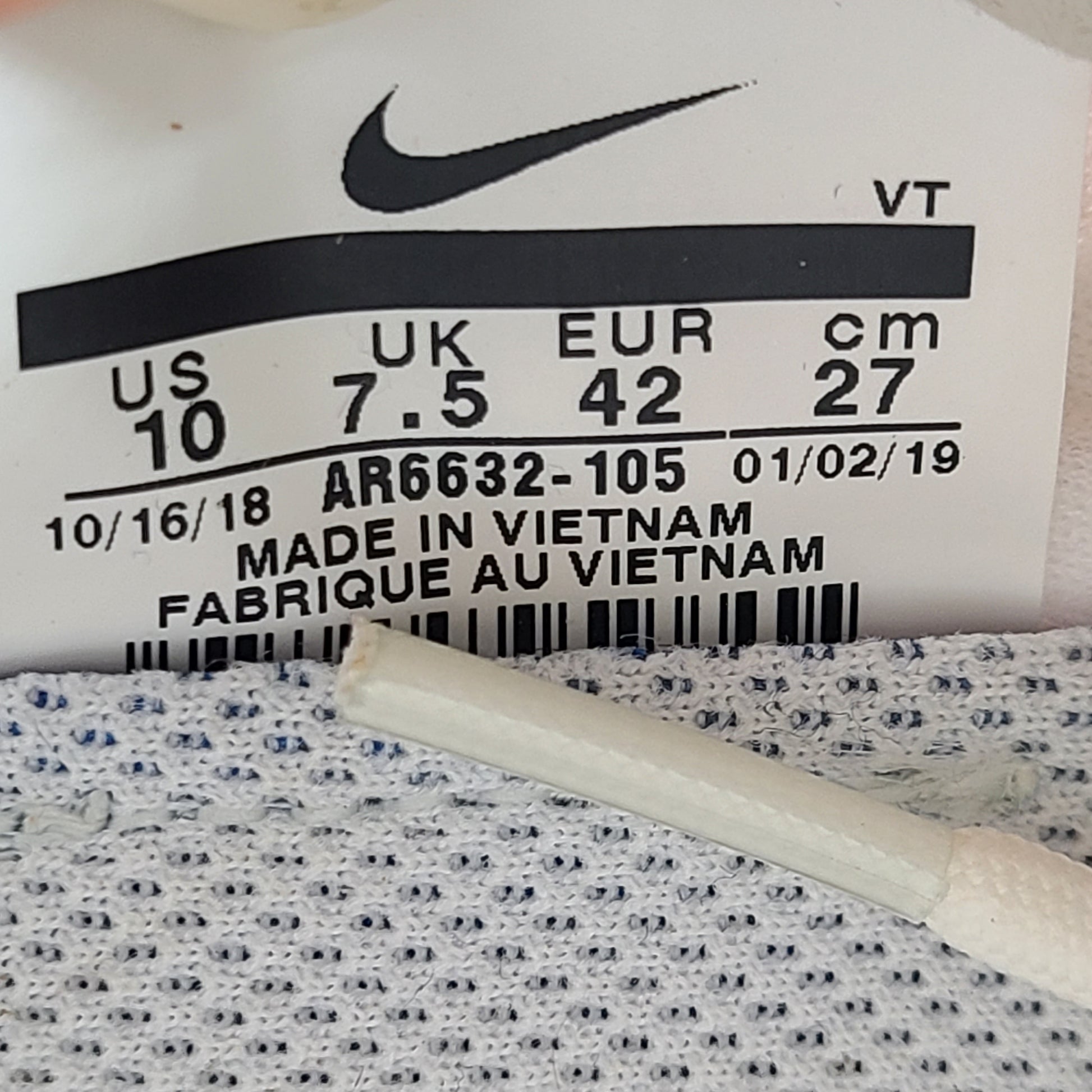 Pink and white Nike Air VaporMax 2019 women's sneakers in US size 10.