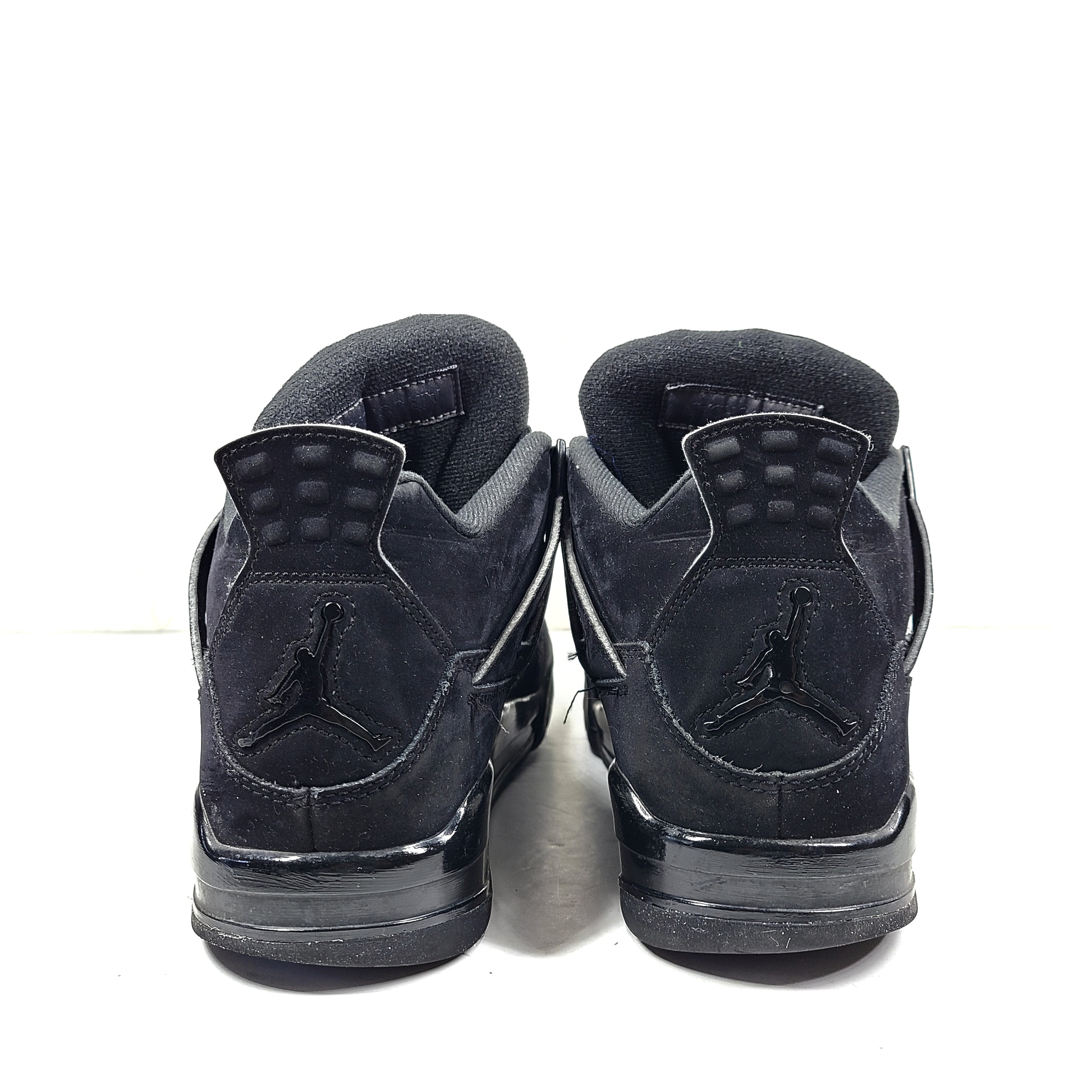 A pair of Nike Air Jordan 4 IV Retro Black Cat CU1110-010 Men's Shoes in black color