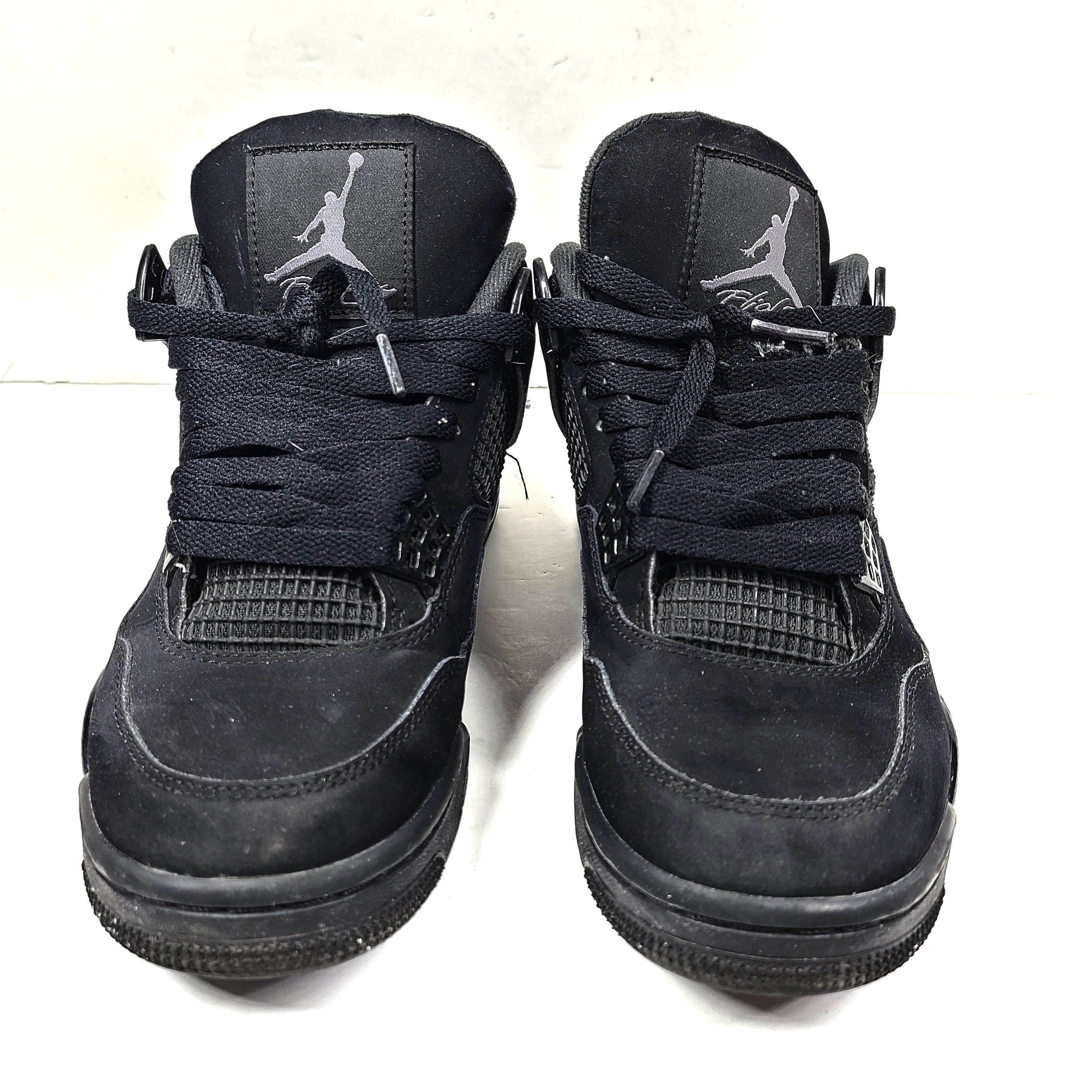 A pair of Nike Air Jordan 4 IV Retro Black Cat CU1110-010 Men's Shoes in black color