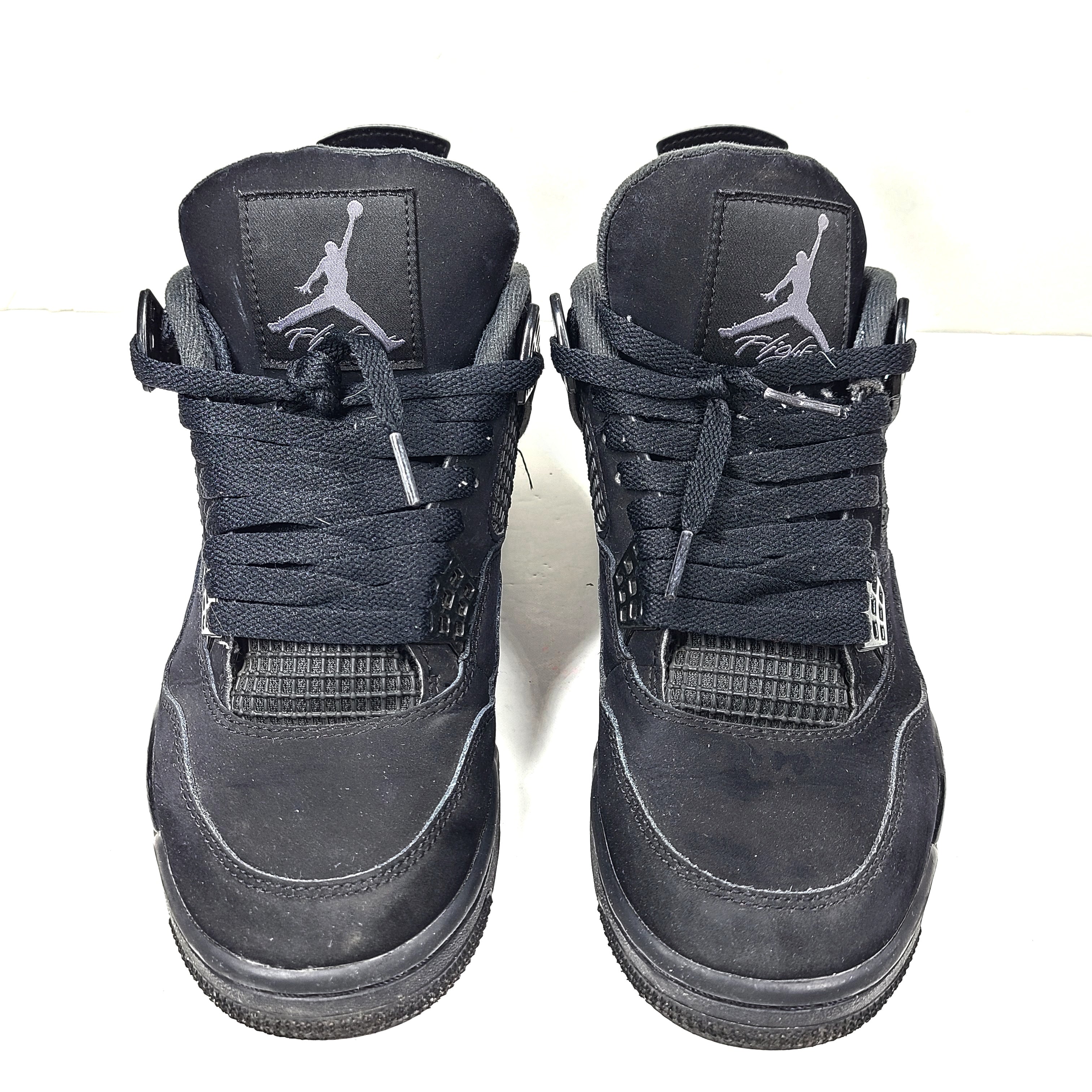 A pair of Nike Air Jordan 4 IV Retro Black Cat CU1110-010 Men's Shoes in black color