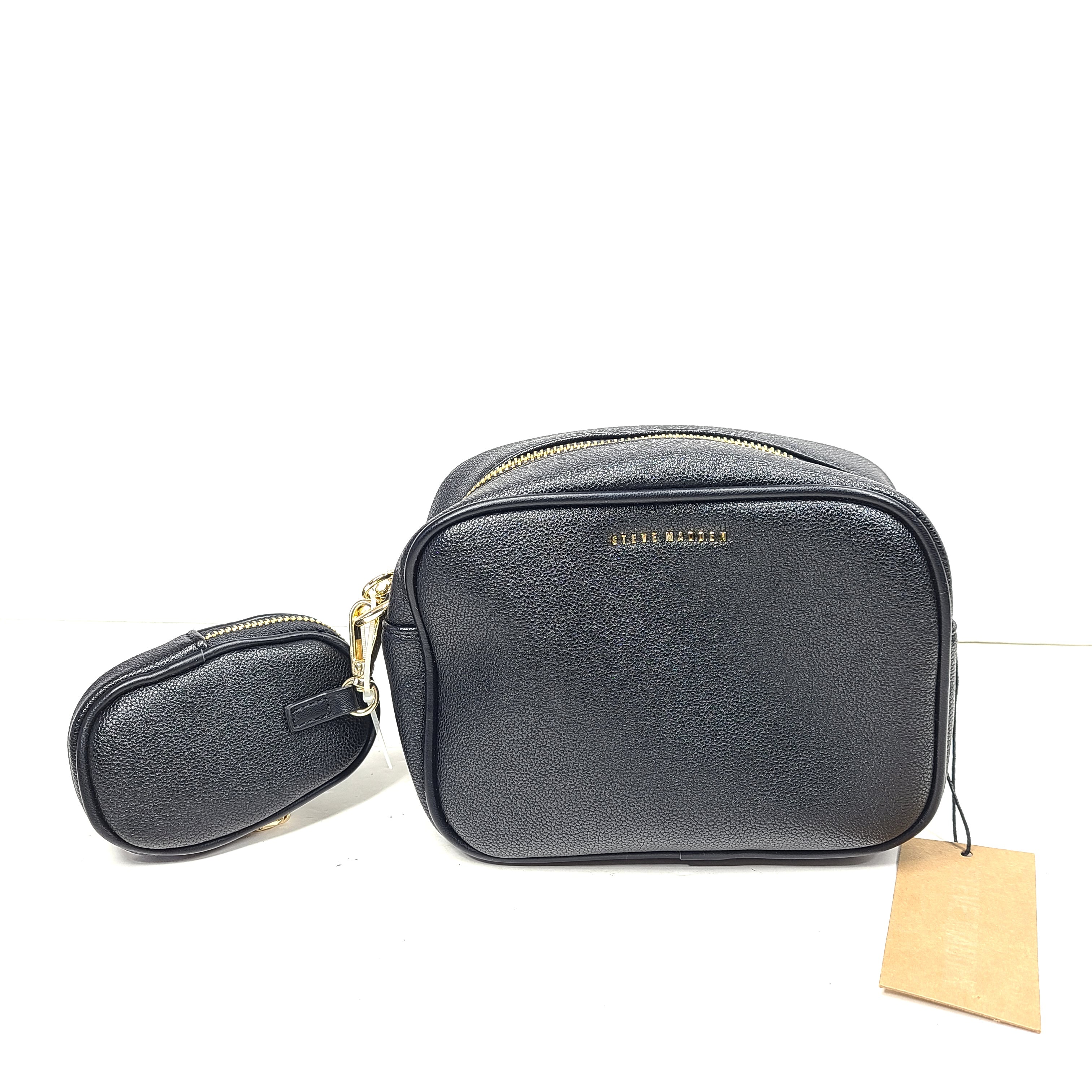 A stylish black crossbody bag with a detachable pouch and gold chain strap.