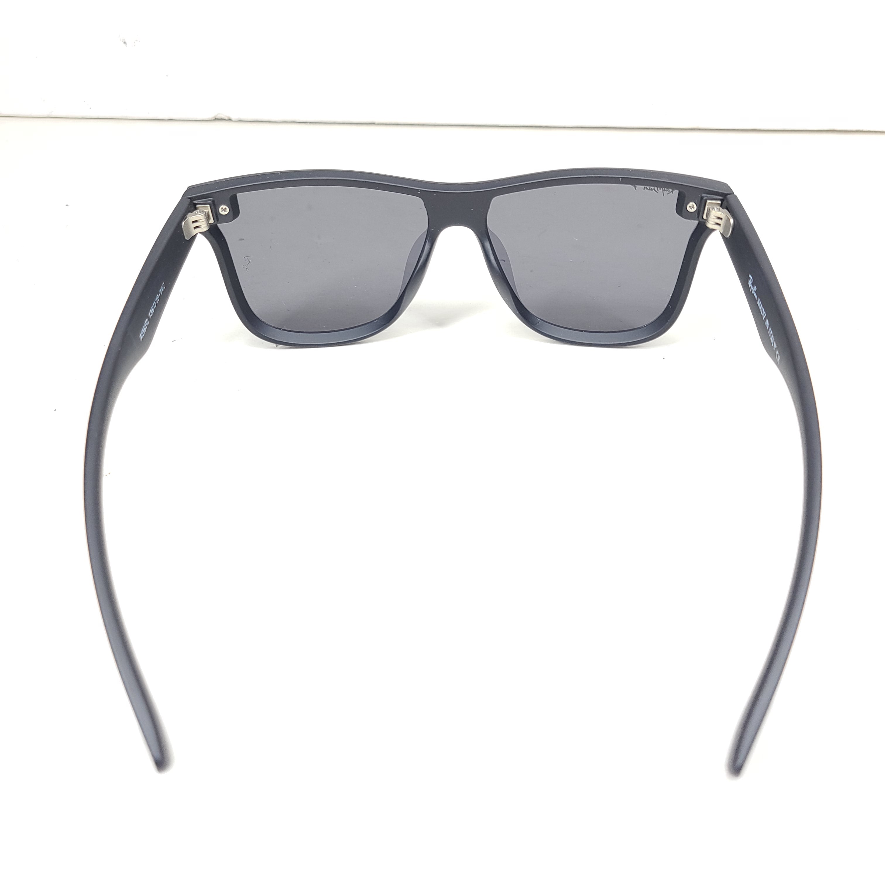 A pair of black polarized Ray-Ban RB650 sunglasses for men.