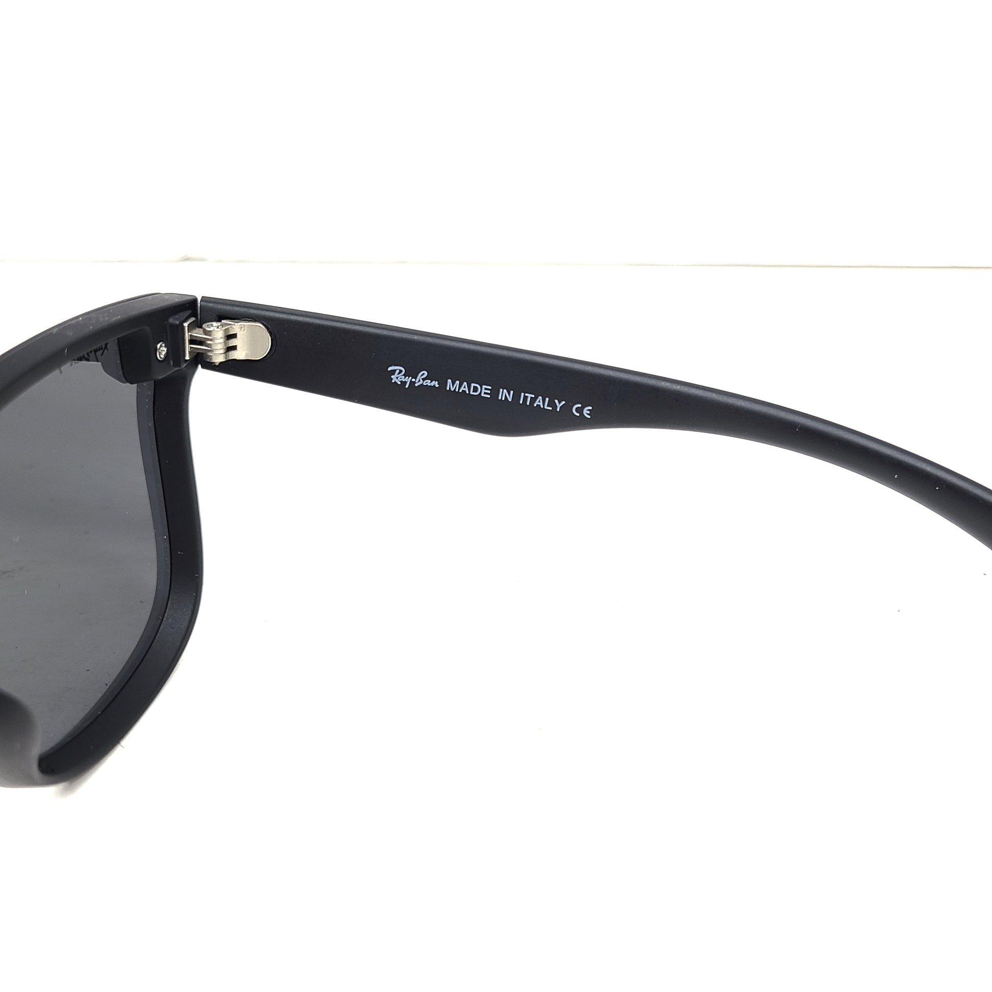 A pair of black polarized Ray-Ban RB650 sunglasses for men.