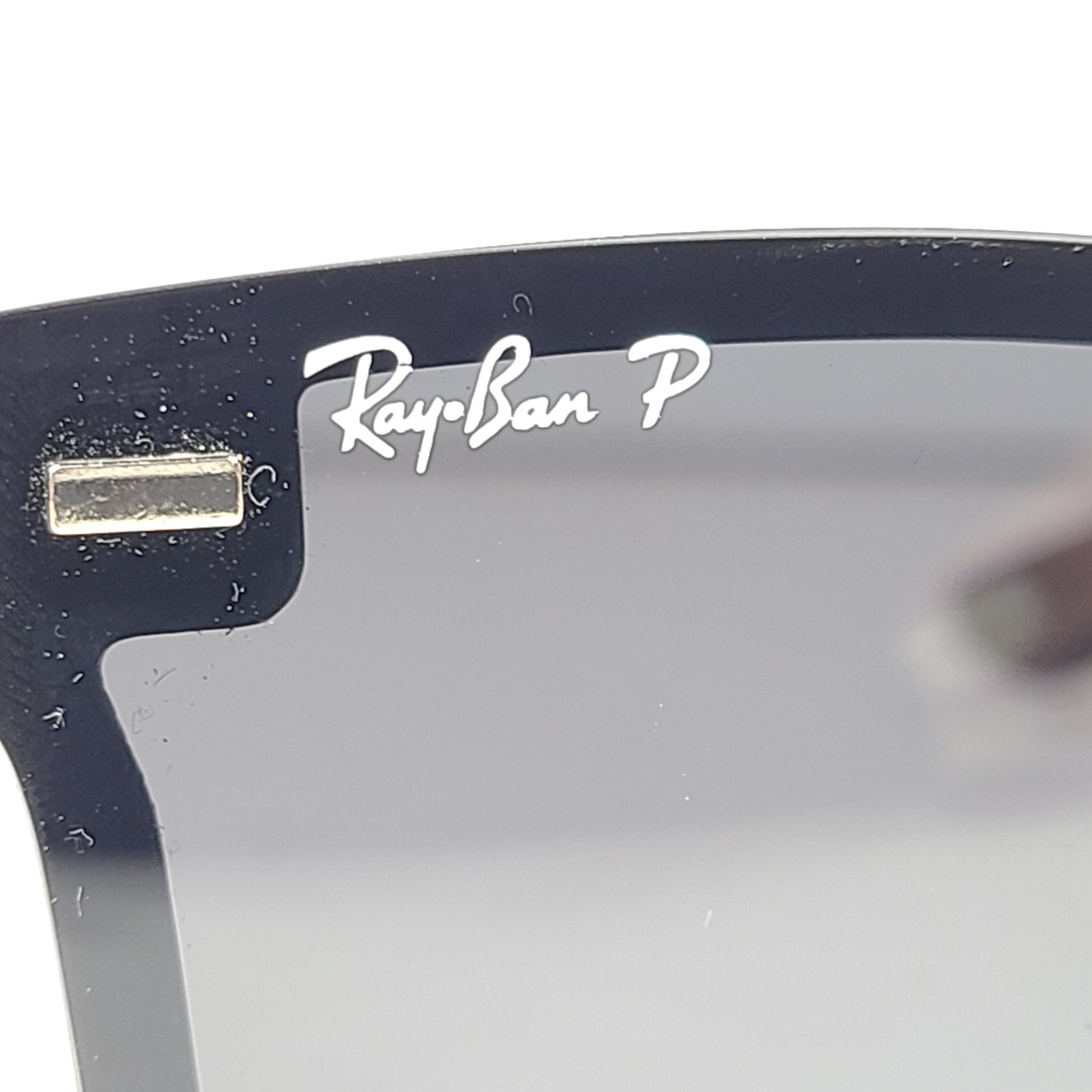 A pair of black polarized Ray-Ban RB650 sunglasses for men.