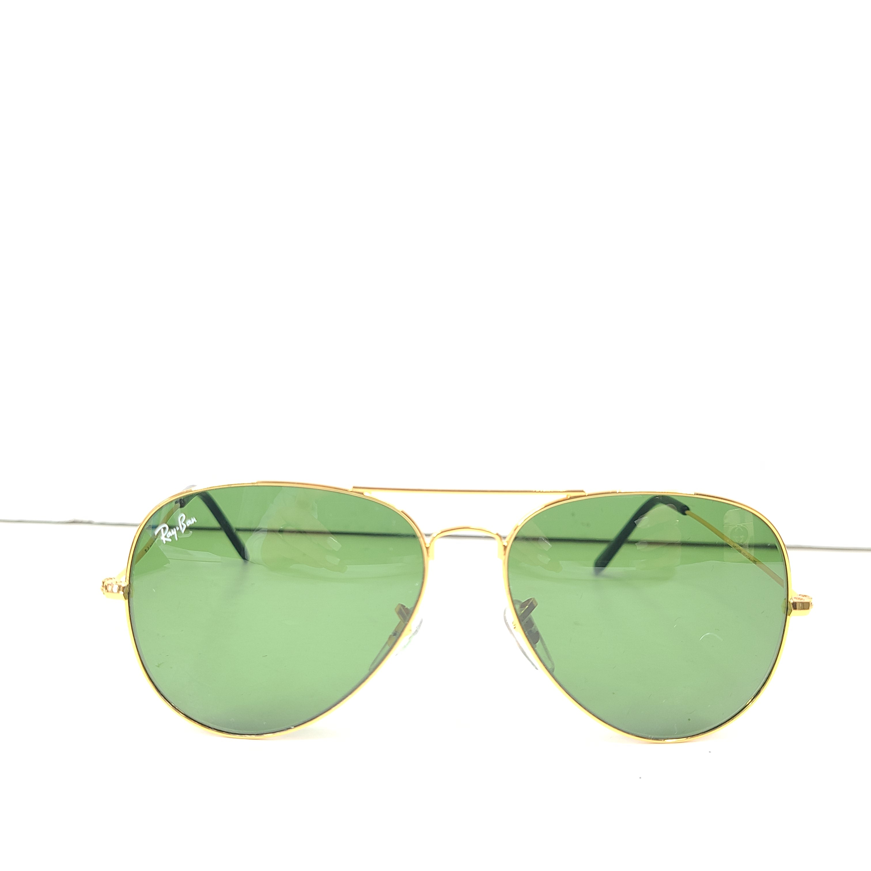 Classic Ray-Ban RB3026 Aviator Sunglasses in green lens and gold frame for men.