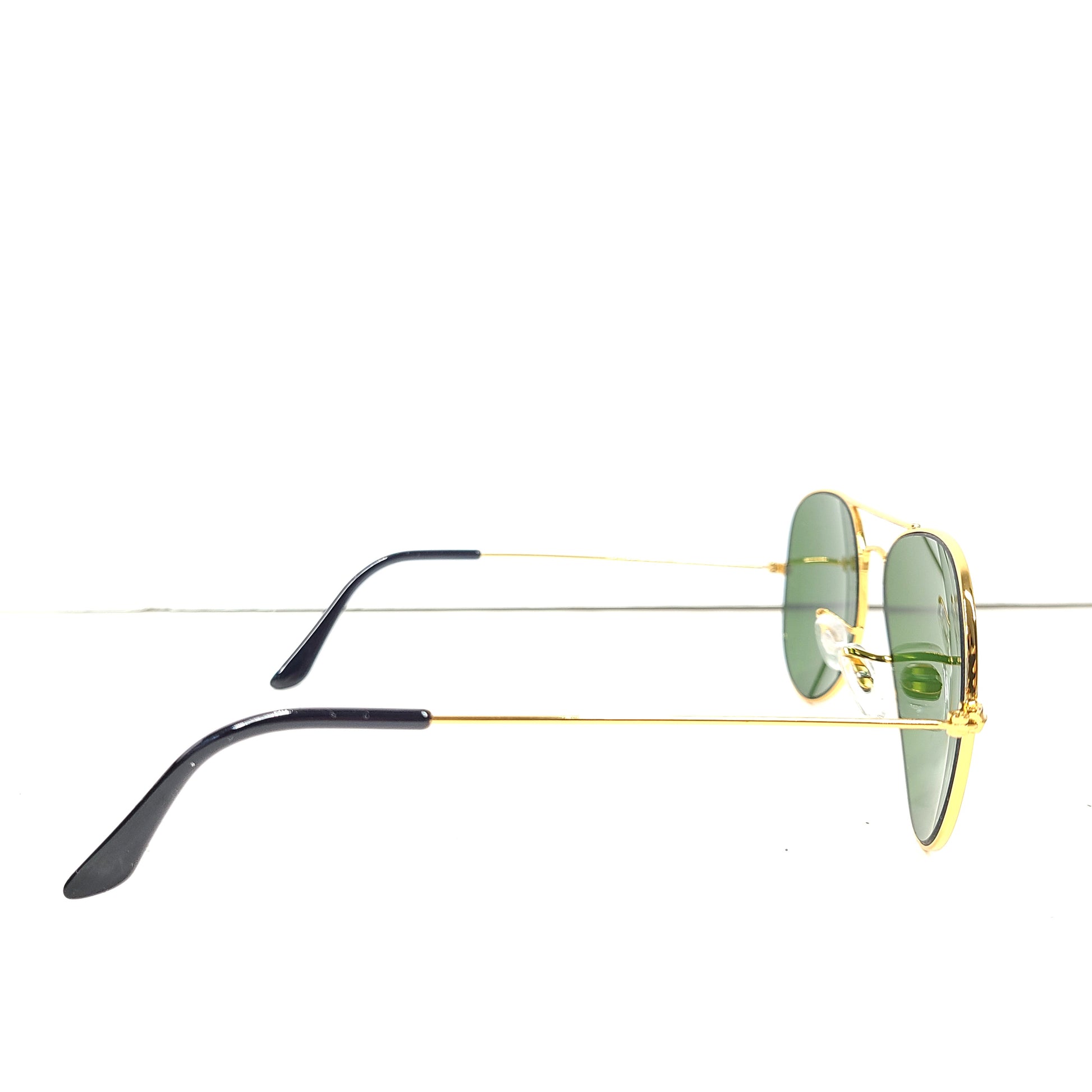 Classic Ray-Ban RB3026 Aviator Sunglasses in green lens and gold frame for men.