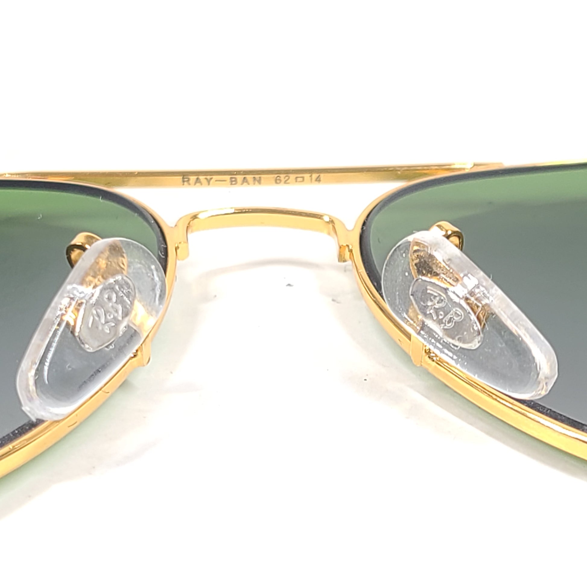 Classic Ray-Ban RB3026 Aviator Sunglasses in green lens and gold frame for men.