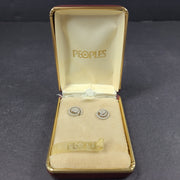 Pair of diamond swirl stud earrings in original box