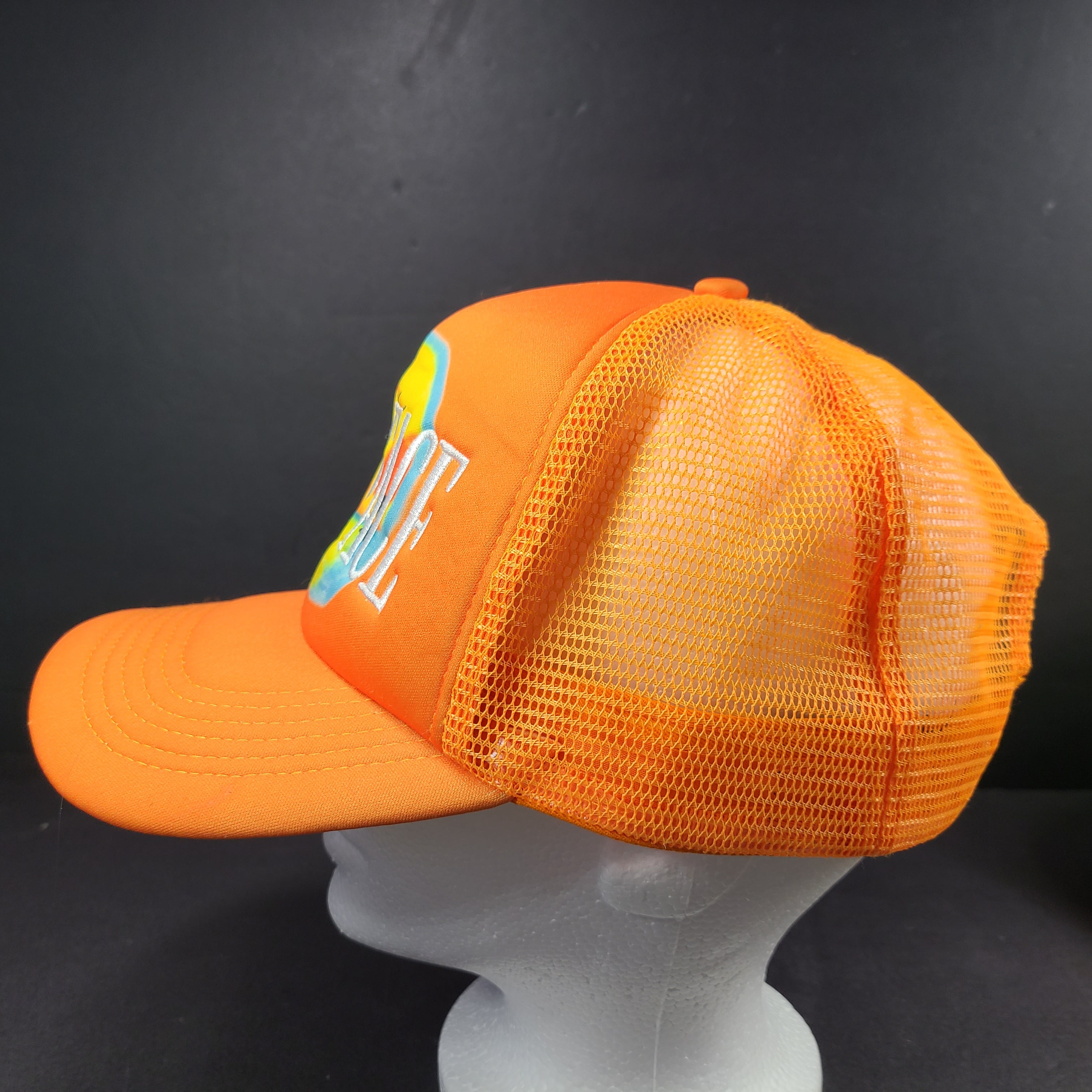 Scarface x Shoe Palace Miami orange trucker hat with mesh design and snapback closure