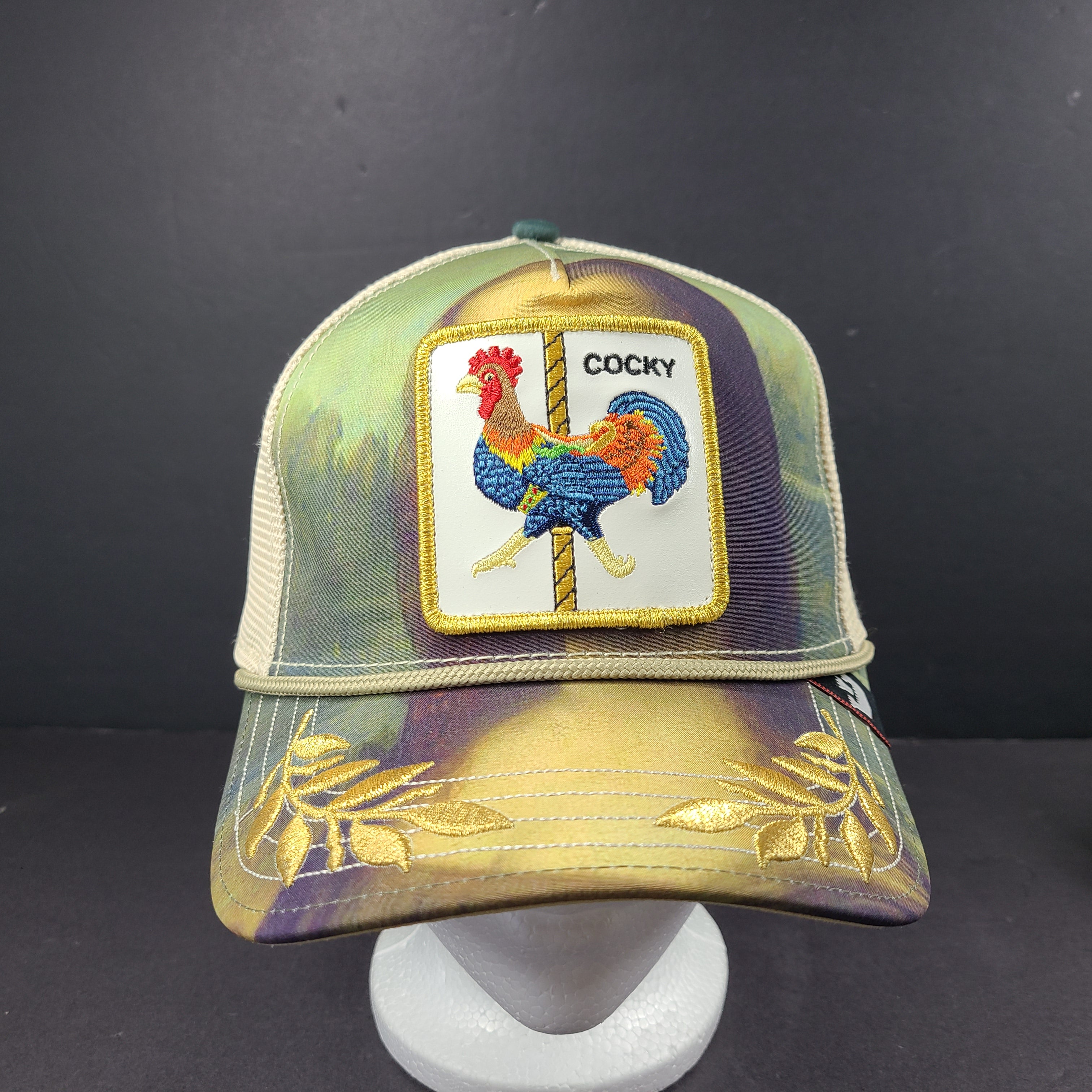 A stylish Goorin Bros The Farm Cocky Rooster Trucker Hat for men.