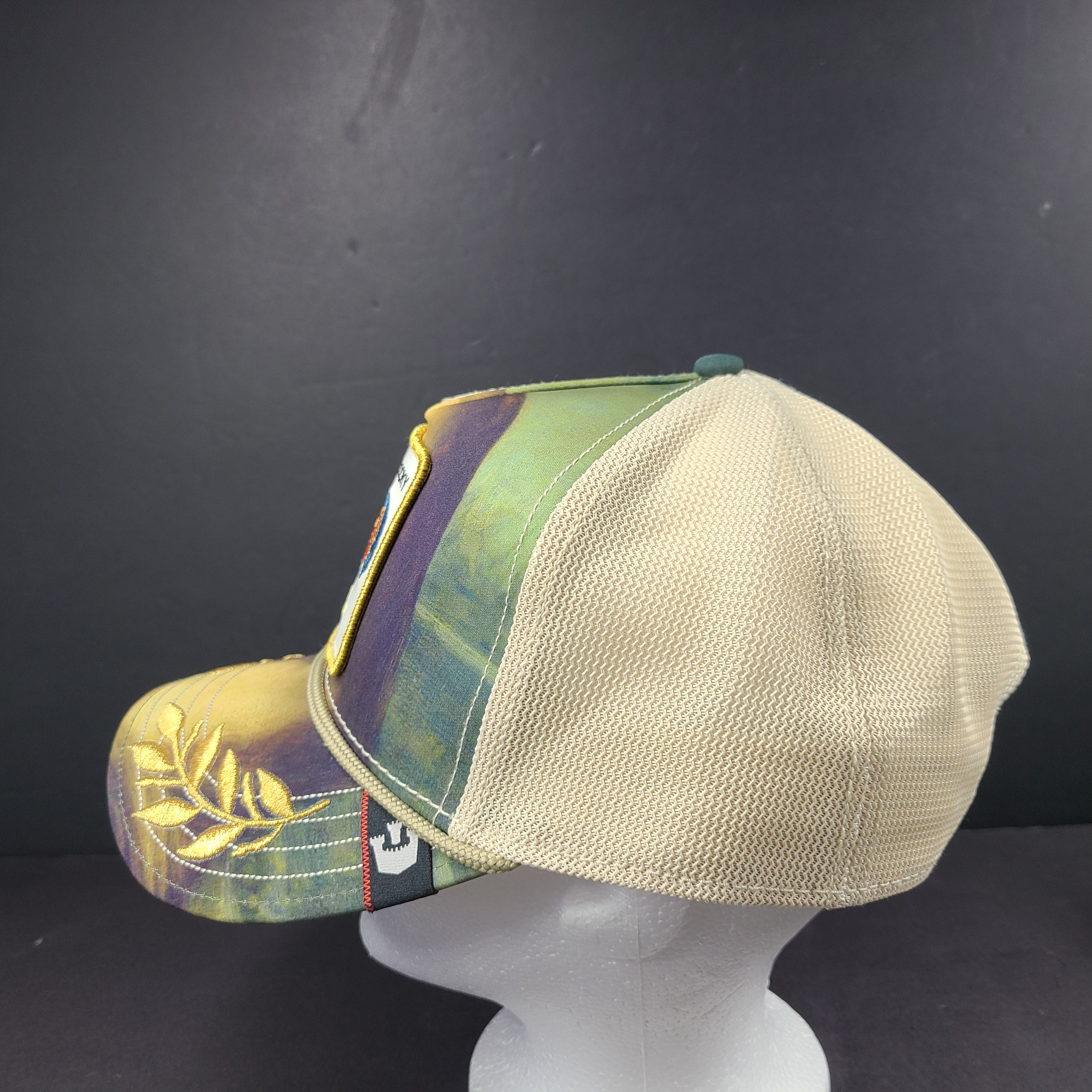 A stylish Goorin Bros The Farm Cocky Rooster Trucker Hat for men.