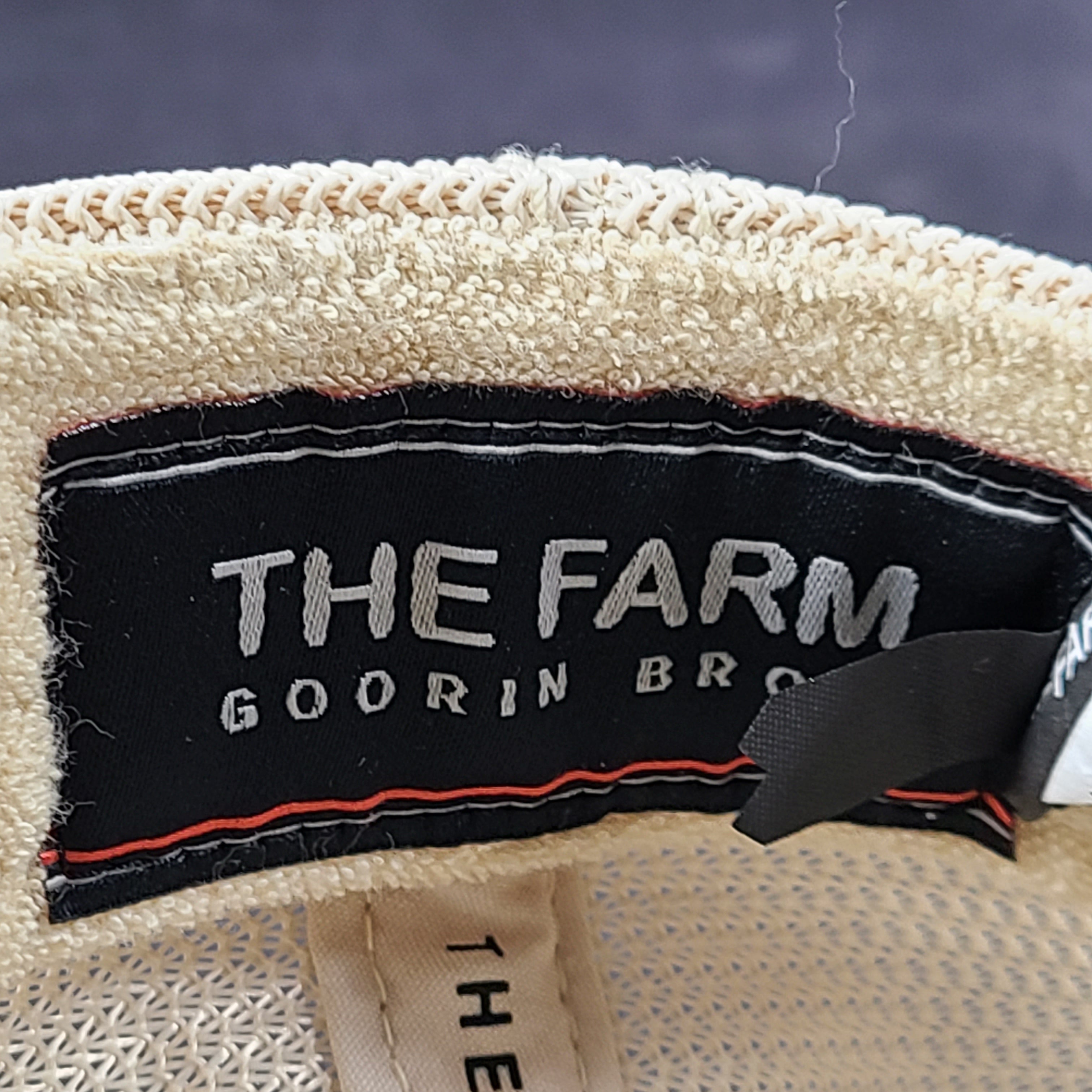 A stylish Goorin Bros The Farm Cocky Rooster Trucker Hat for men.