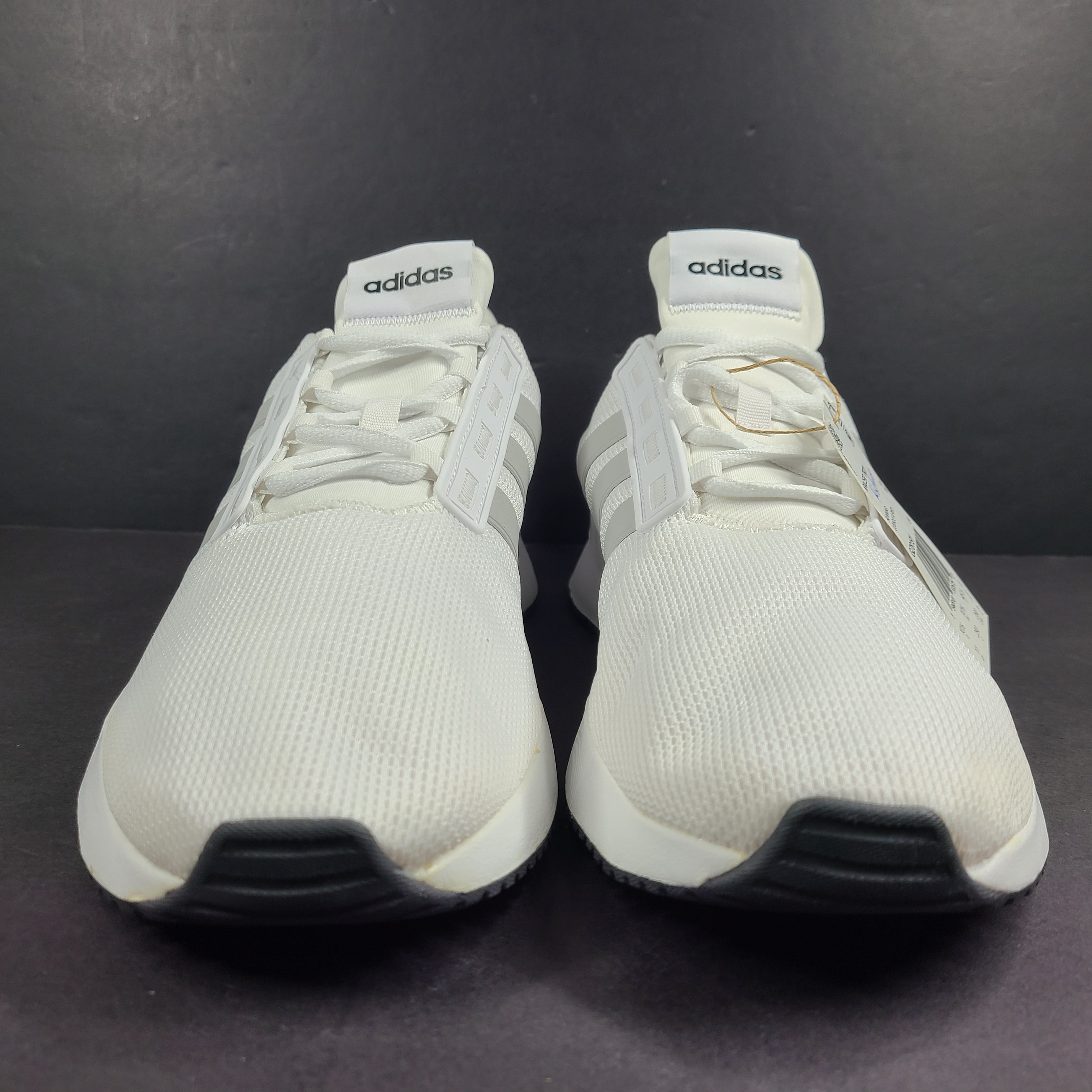 Comfortable white men’s shoes by Adidas