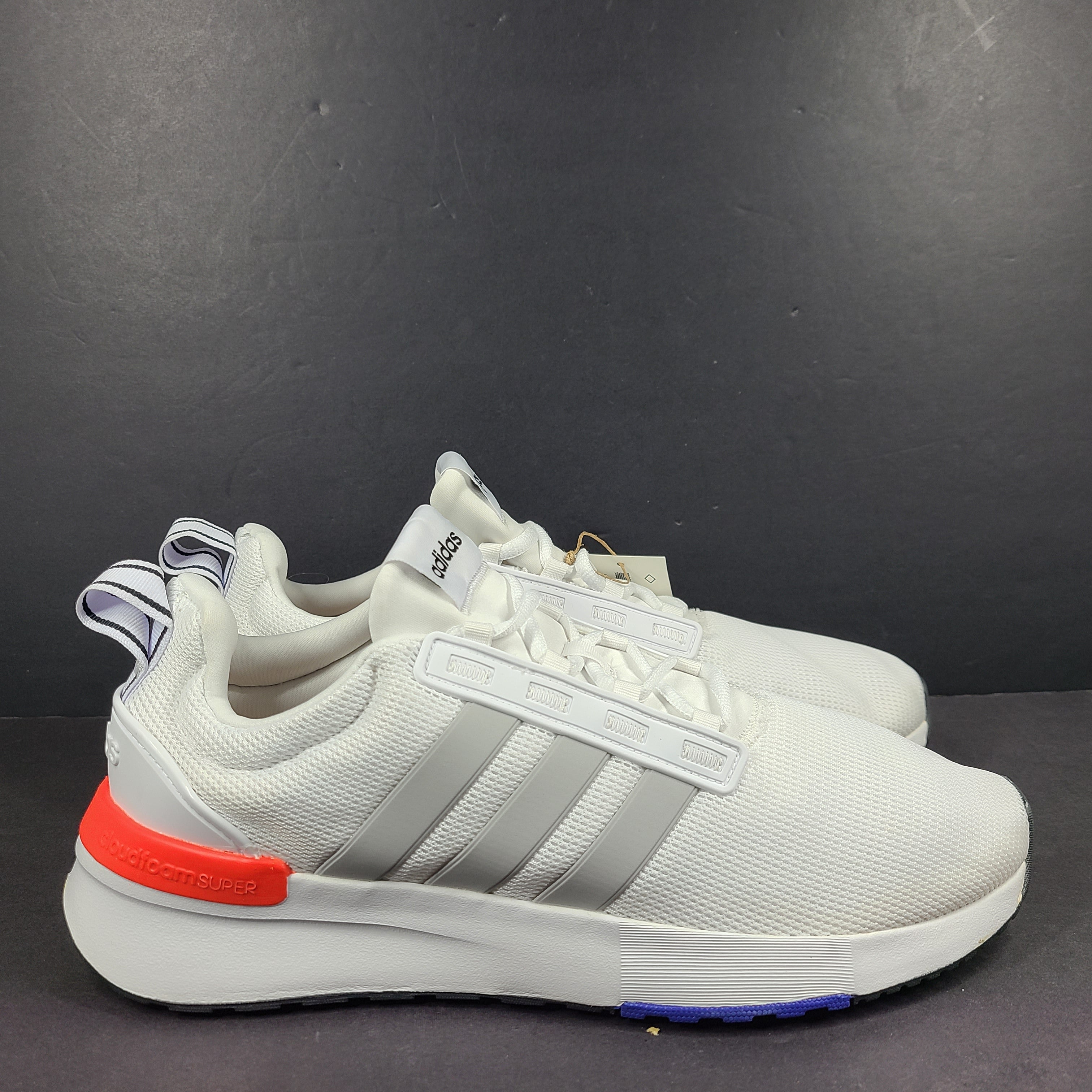 Comfortable white men’s shoes by Adidas