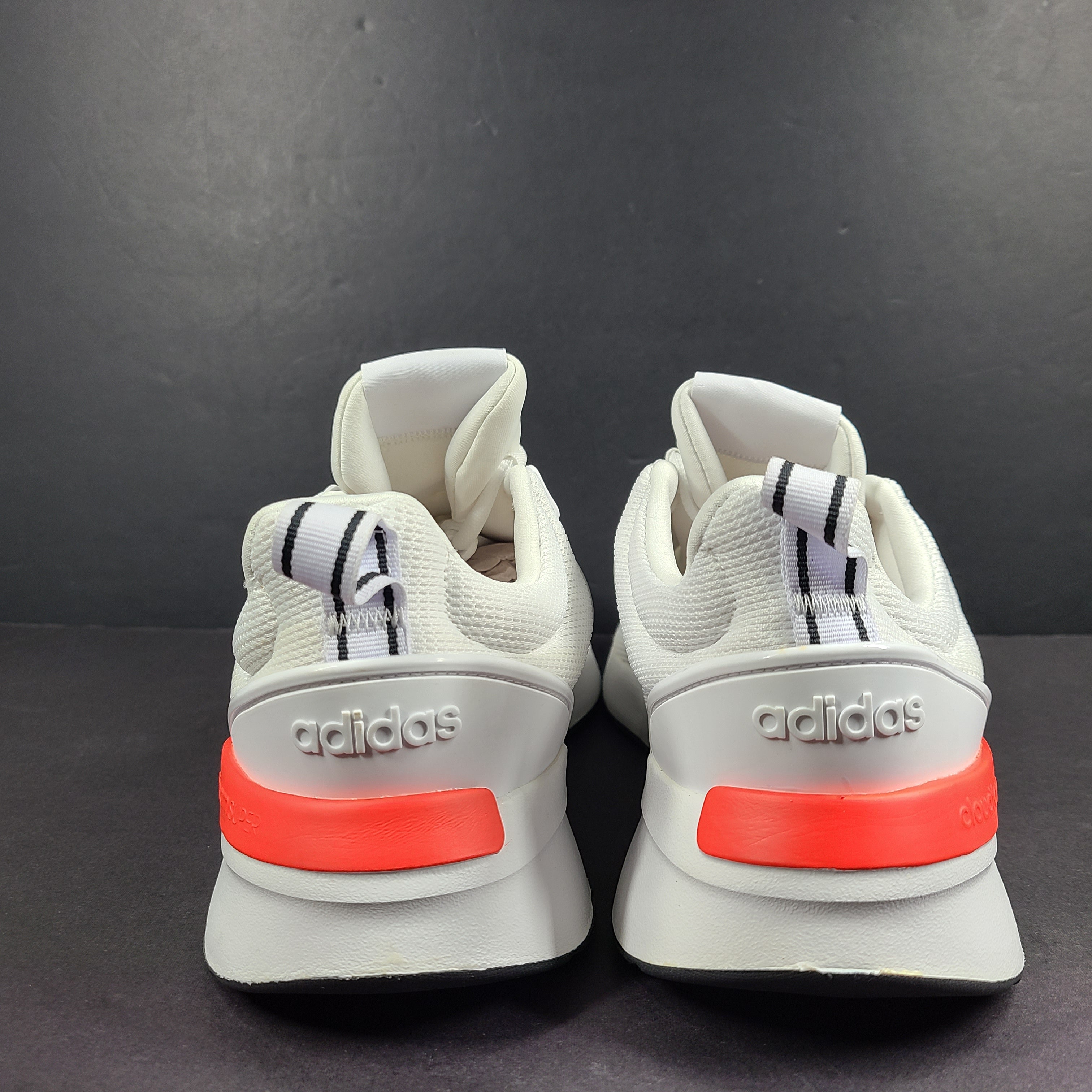 Comfortable white men’s shoes by Adidas