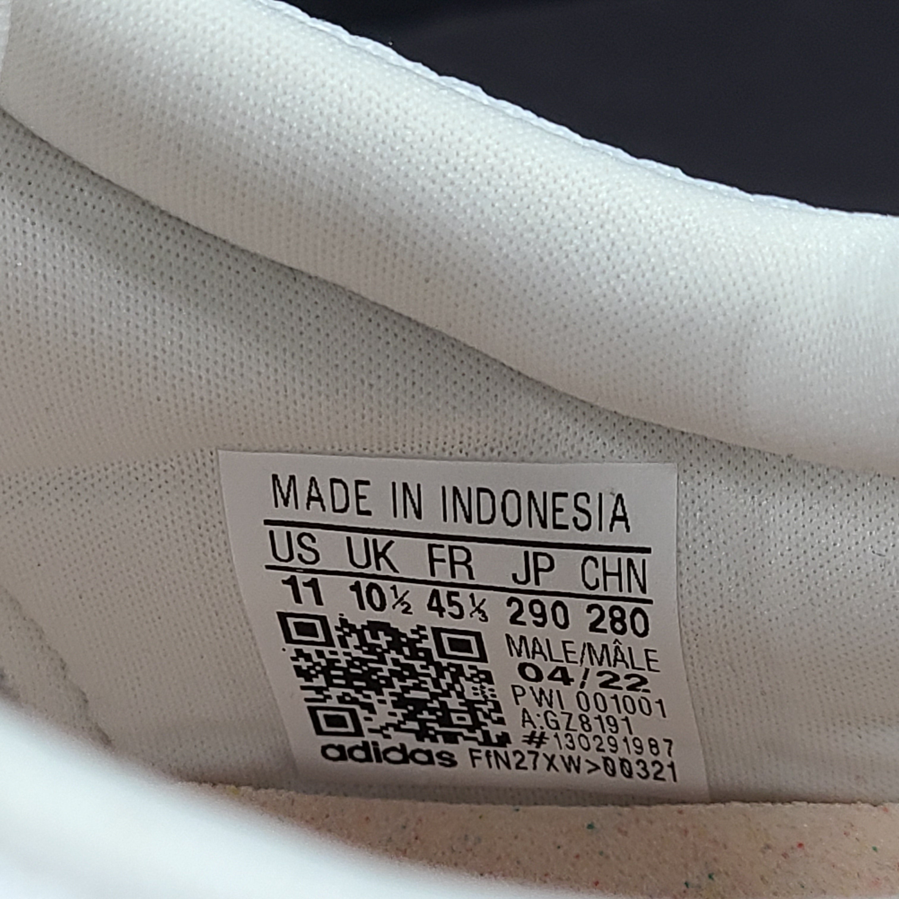 Comfortable white men’s shoes by Adidas