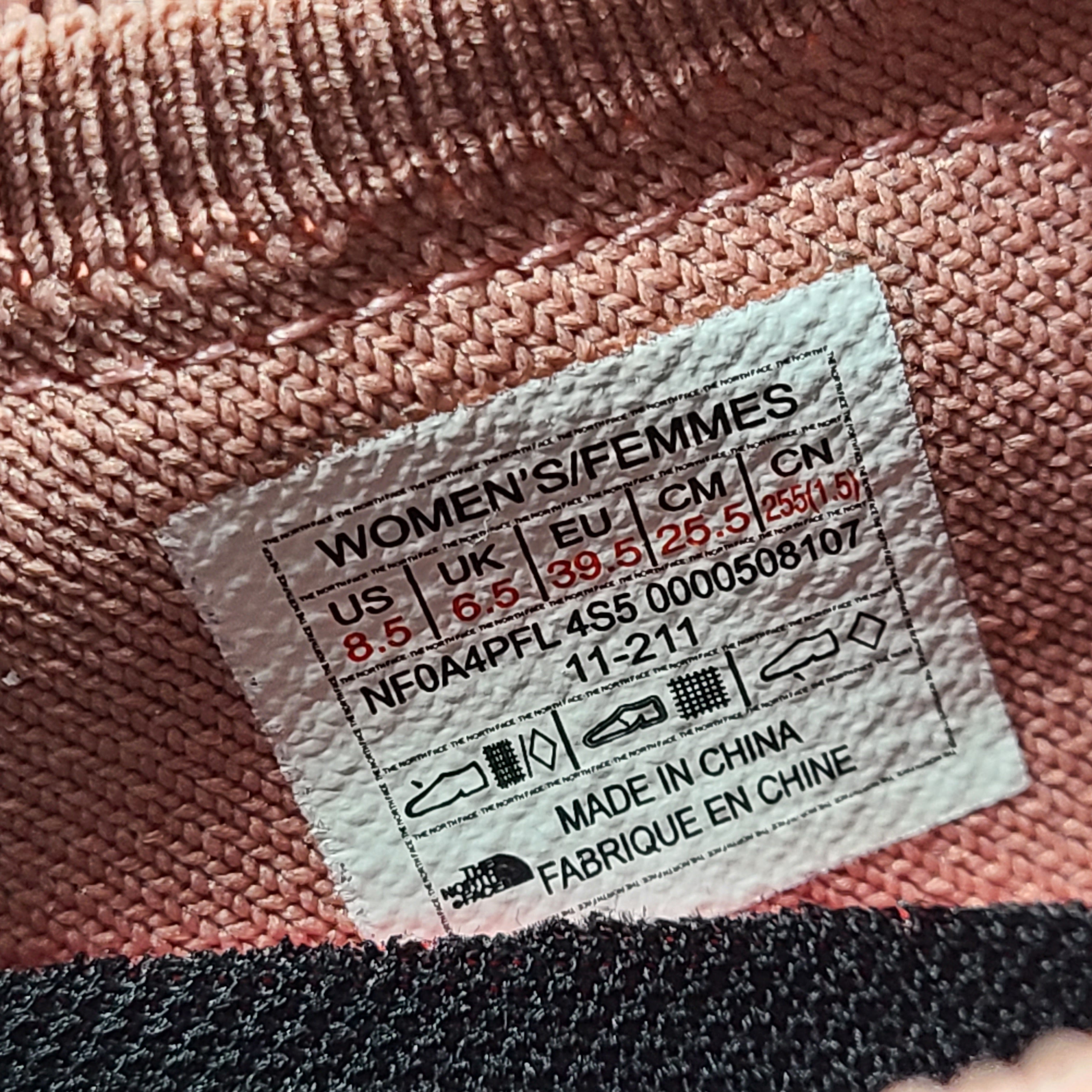 Women's Vectiv shoes in peach and white color