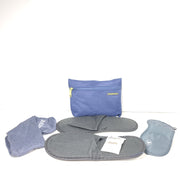 Sleek blue-gray Mandarina Duck Turkish Airlines travel kit pouch with socks, slippers, eye mask and an extra bag for compact organization.