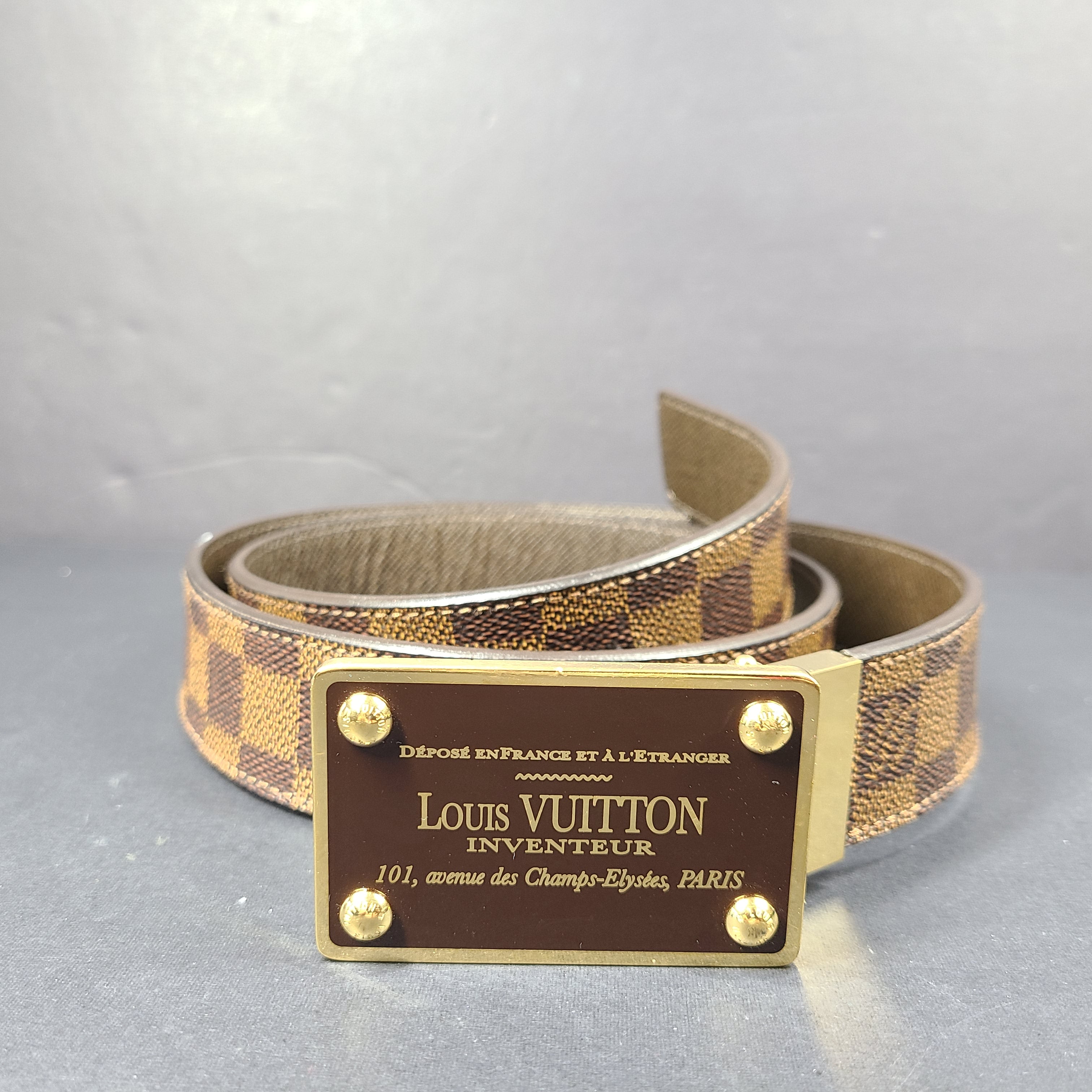 Louis Vuitton Damier canvas belt with Inventeur plaque and brown leather accents, size 95/38.