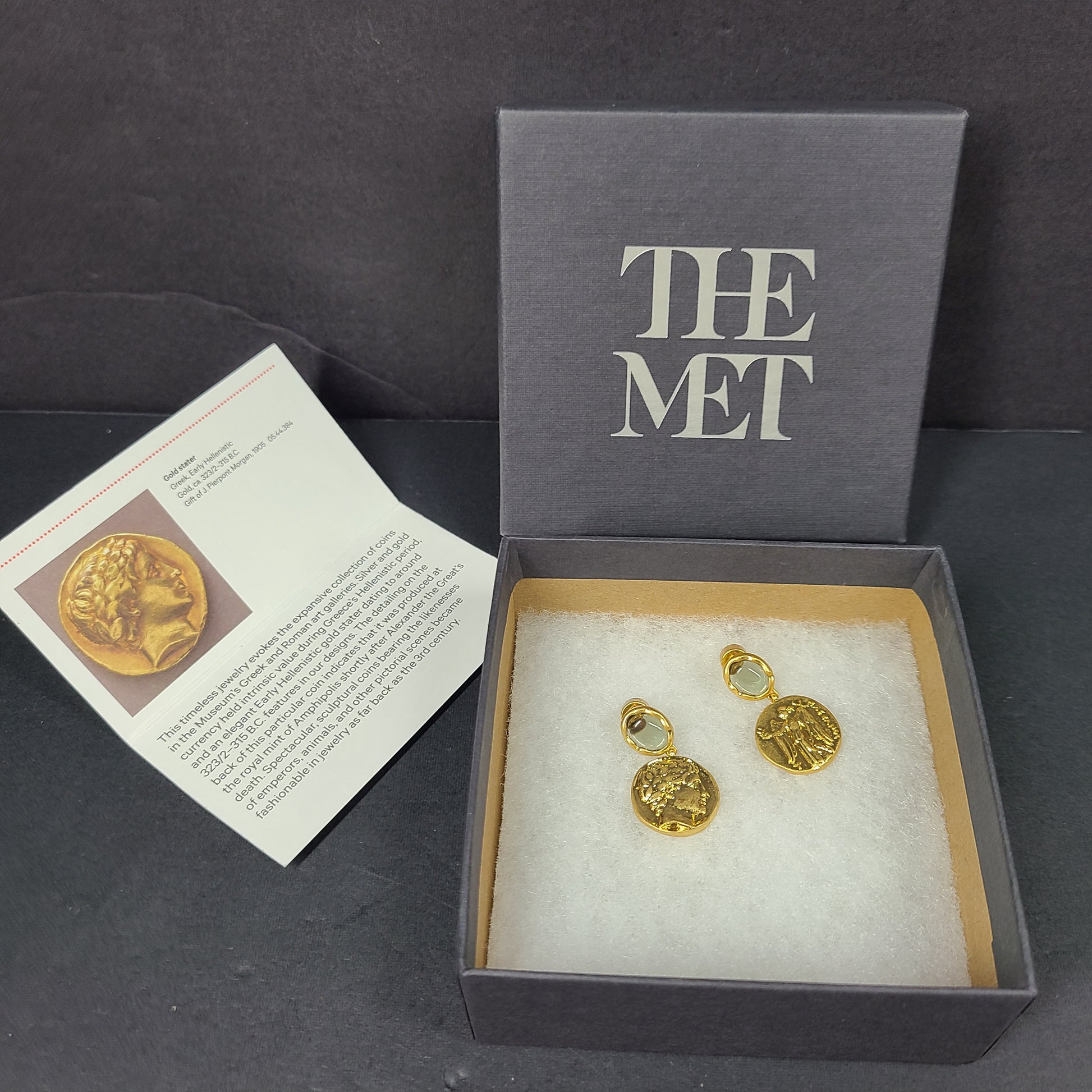 Gold coin-style drop earrings with a Greek Early Hellenistic stater-inspired design and polished finish.