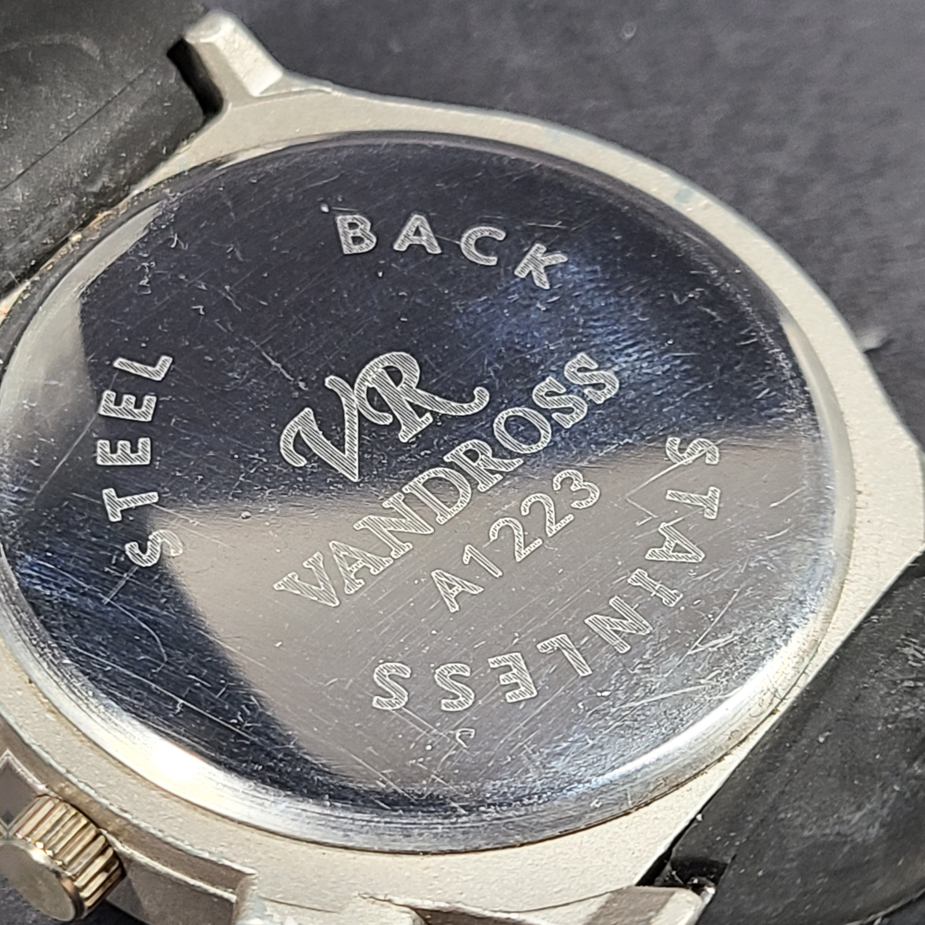 Vandross A1223 wristwatch features a stainless steel back with a silver and black finish for a versatile look.