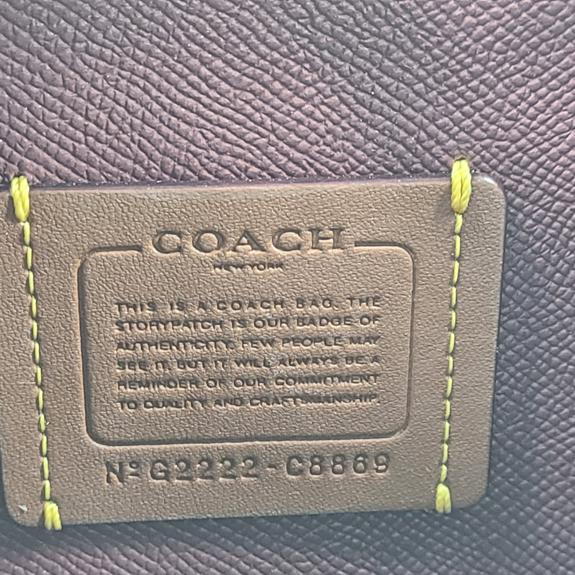 Black Coach G2222-C8869 handbag with a streamlined silhouette and top handles for everyday wear.