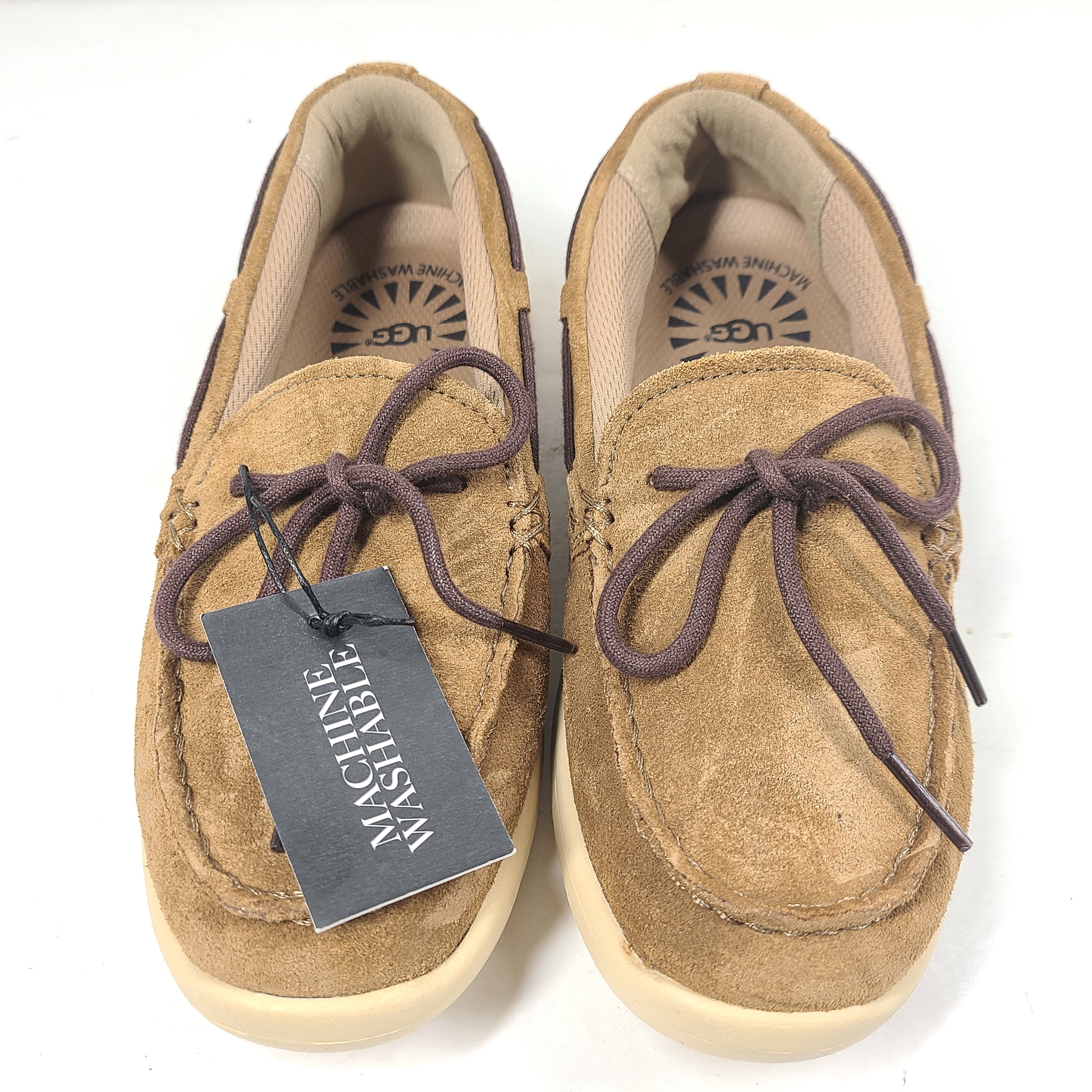 UGG Beach Moc 1102757K in tan delivers a slip-on low-profile fit with cushioned comfort for everyday casual wear.