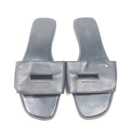 Hermès Calaire black leather sandals in EU 38 that combine Italian craftsmanship with a refined, versatile silhouette.