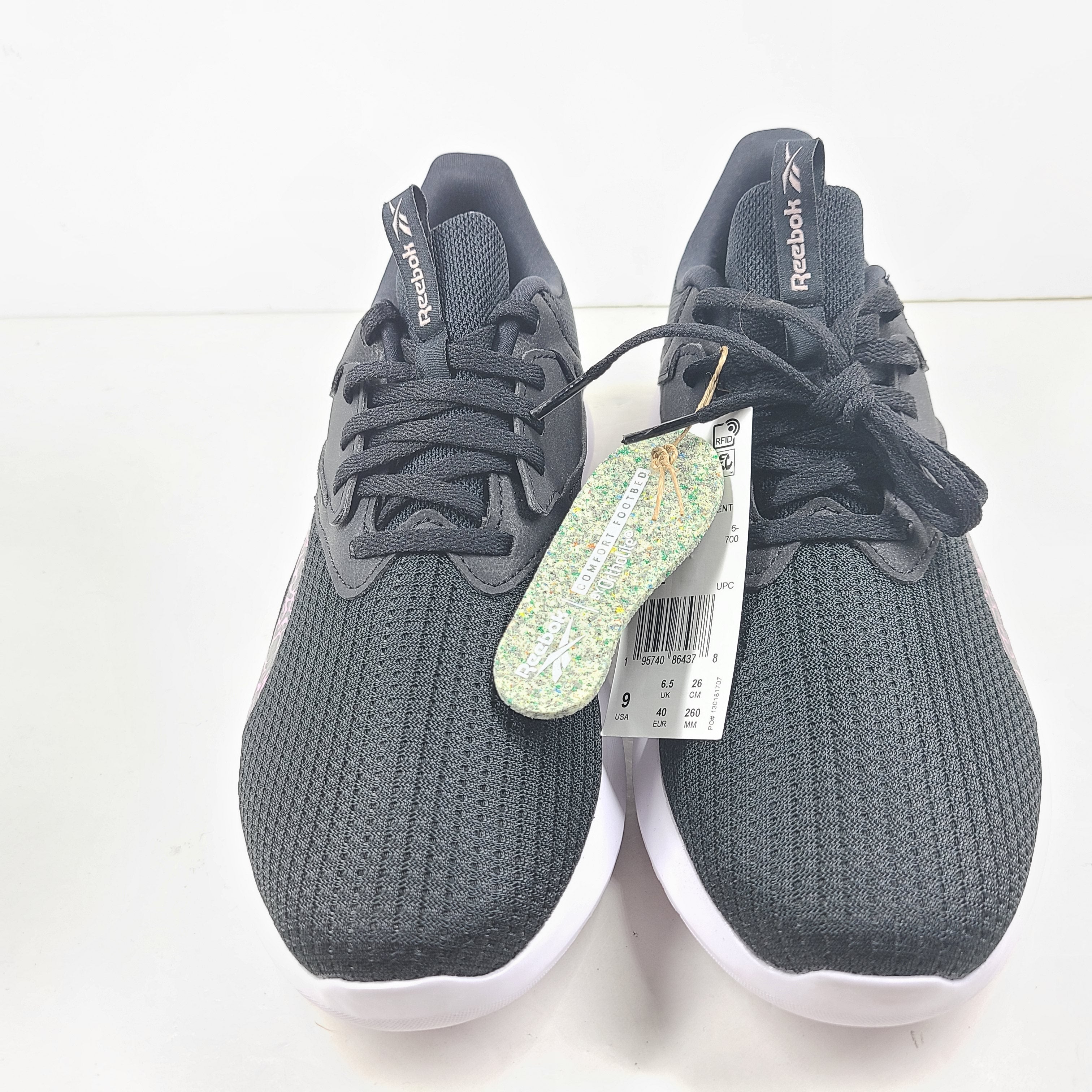 Sleek Reebok Fluxlite GY4052 women's trainers in black, pink and white that offer lightweight support and everyday comfort.