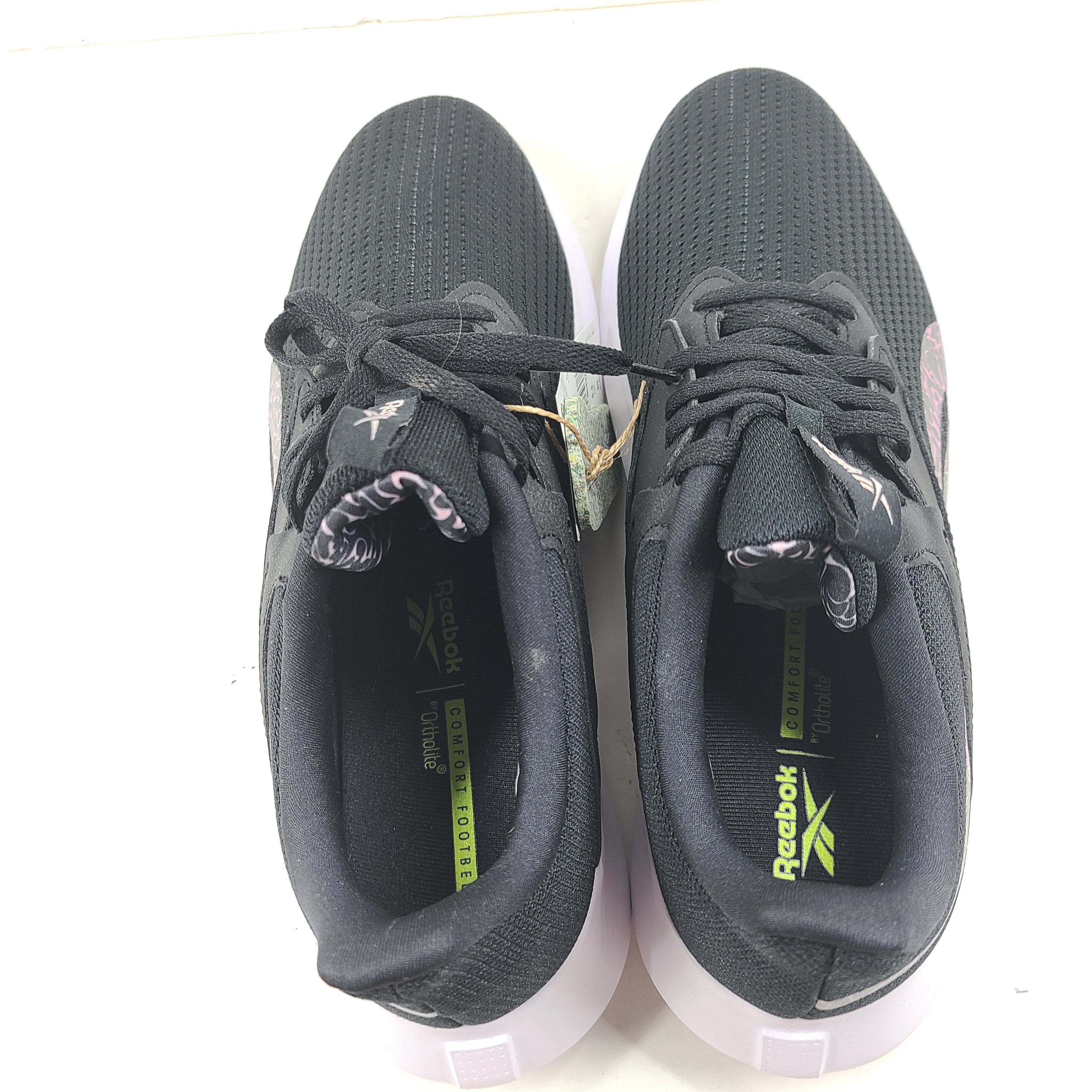Sleek Reebok Fluxlite GY4052 women's trainers in black, pink and white that offer lightweight support and everyday comfort.
