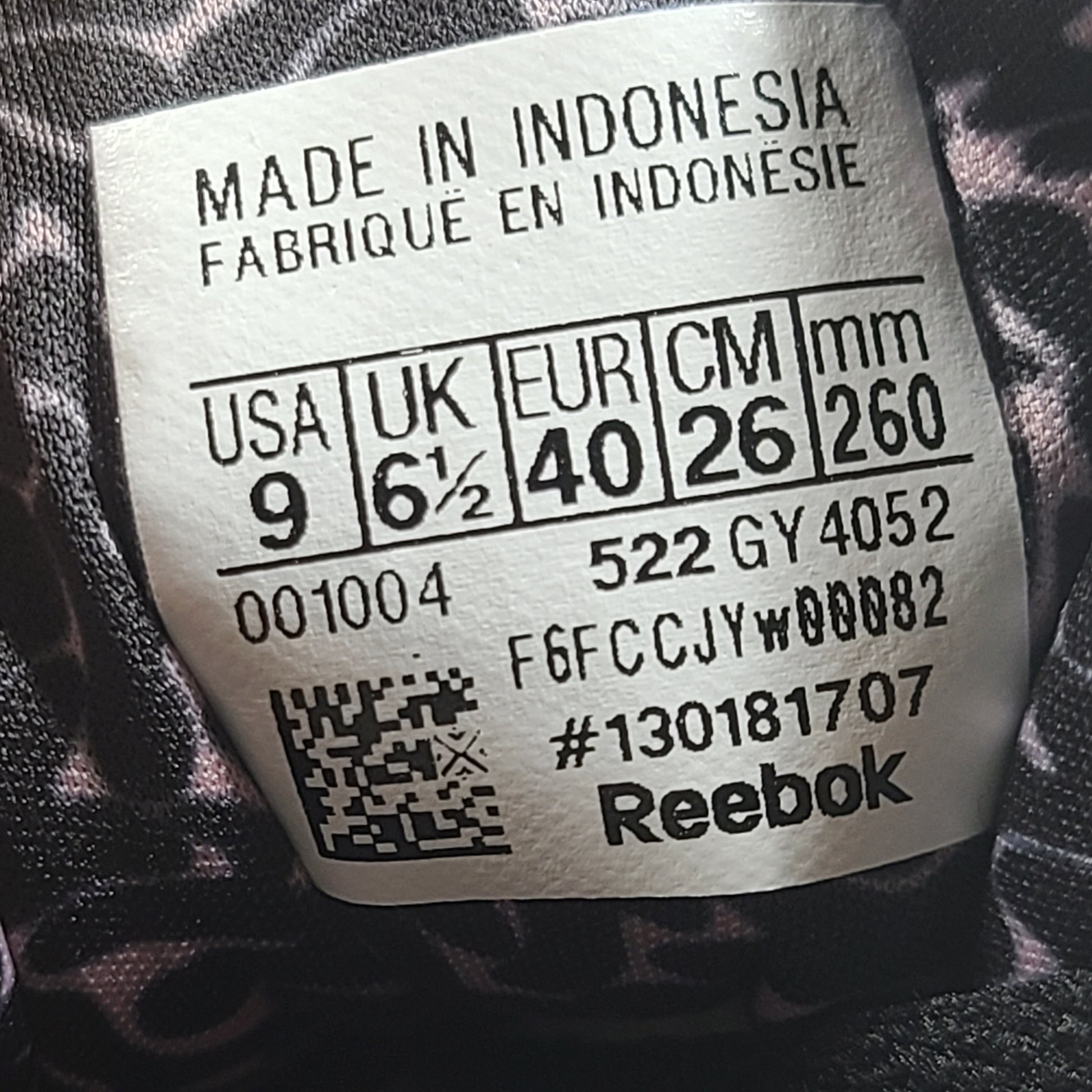 Sleek Reebok Fluxlite GY4052 women's trainers in black, pink and white that offer lightweight support and everyday comfort.