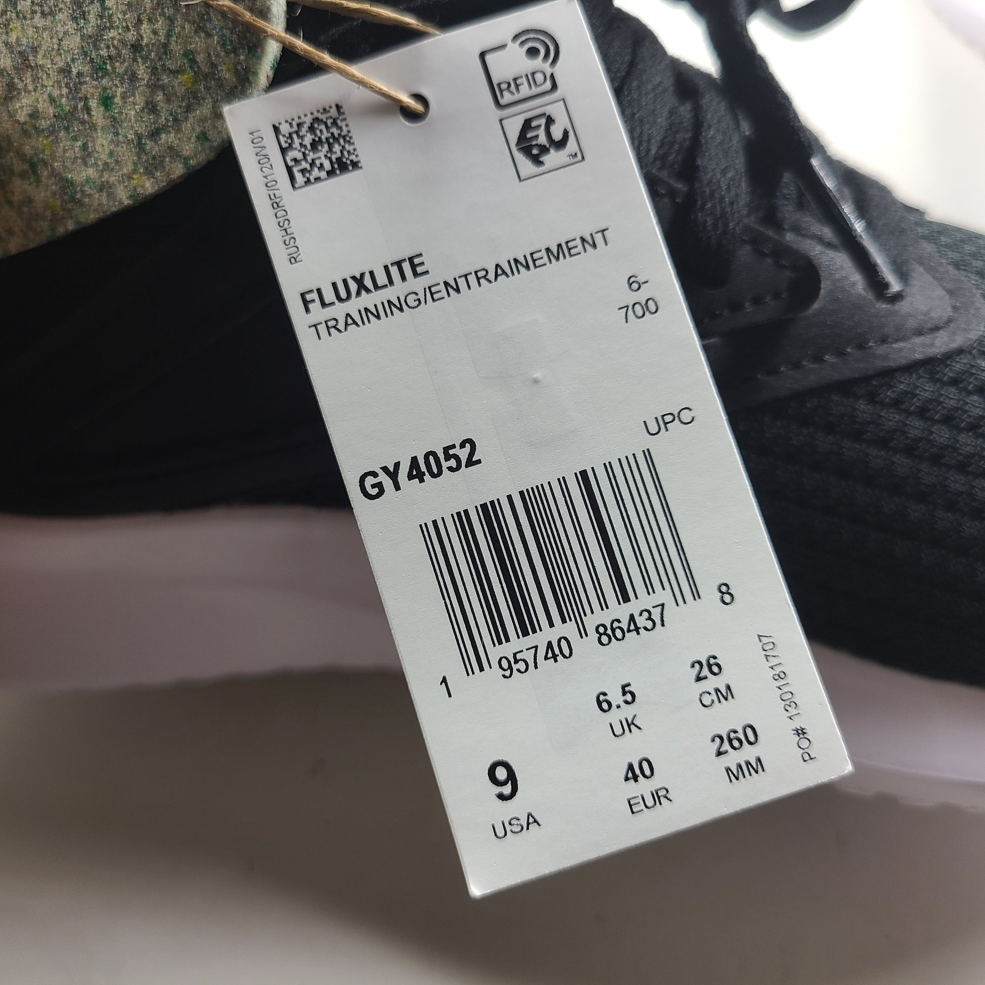 Sleek Reebok Fluxlite GY4052 women's trainers in black, pink and white that offer lightweight support and everyday comfort.