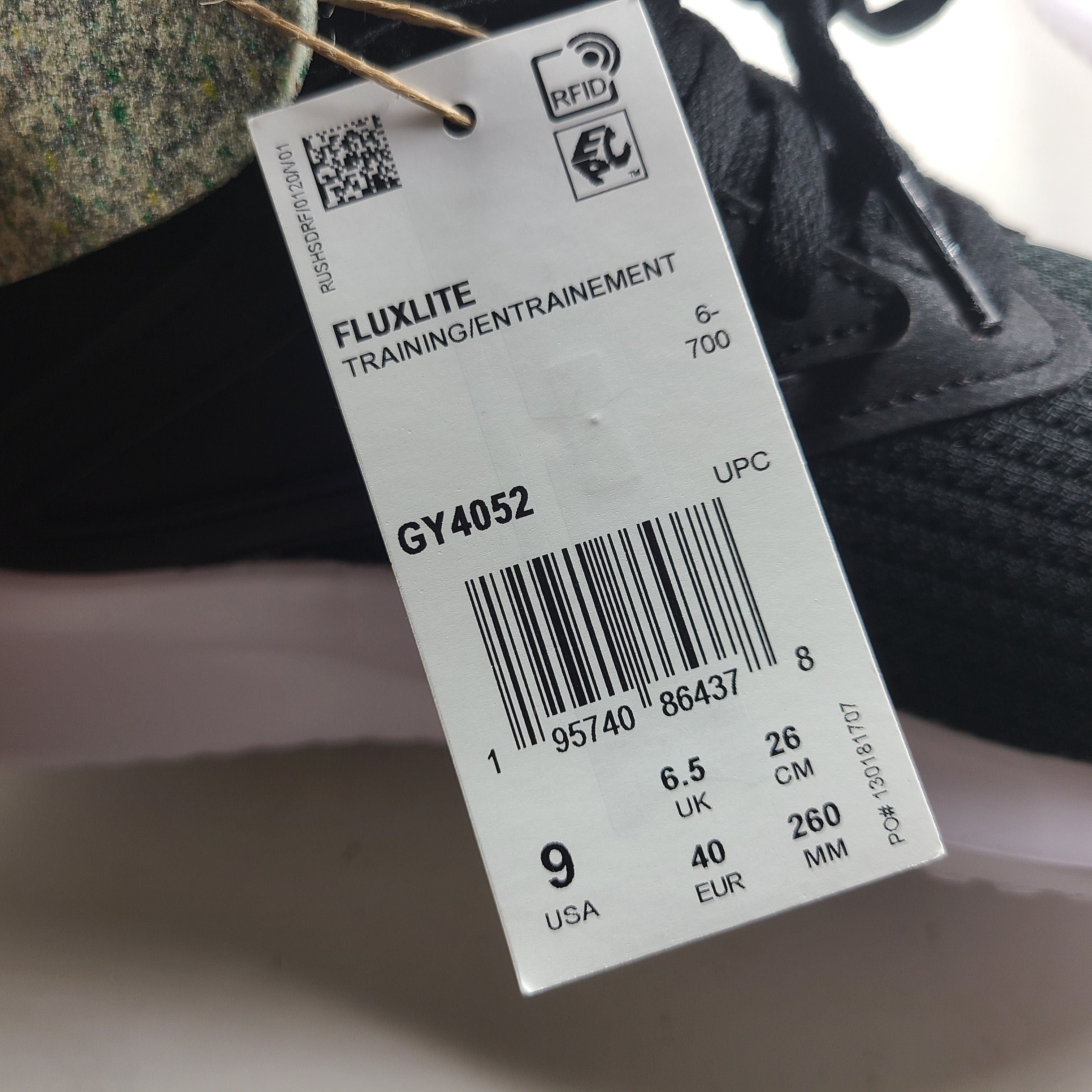 Sleek Reebok Fluxlite GY4052 women's trainers in black, pink and white that offer lightweight support and everyday comfort.
