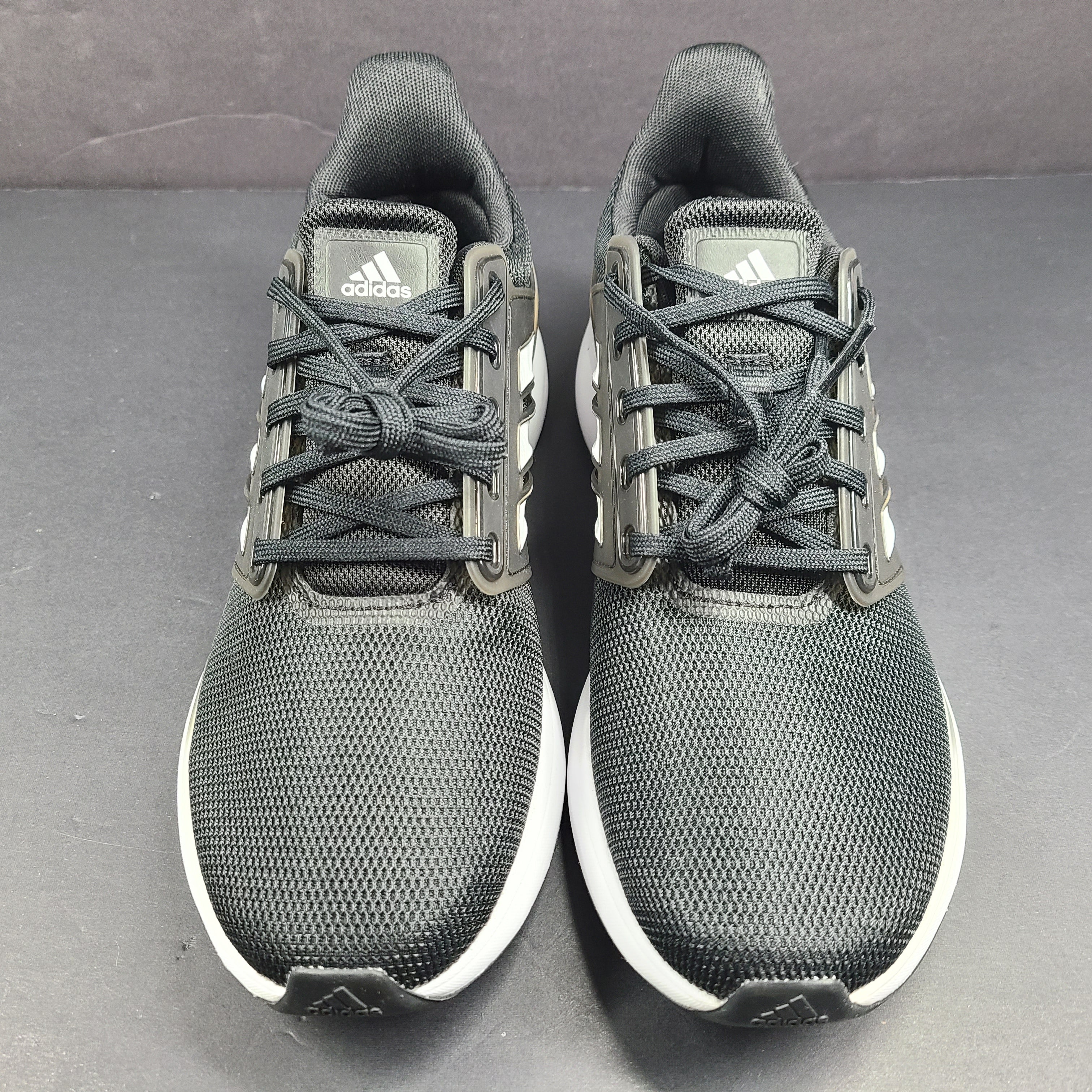 Black Adidas Cloudfoam Comfort men's sneakers in US size 11 with a low-profile athletic design.