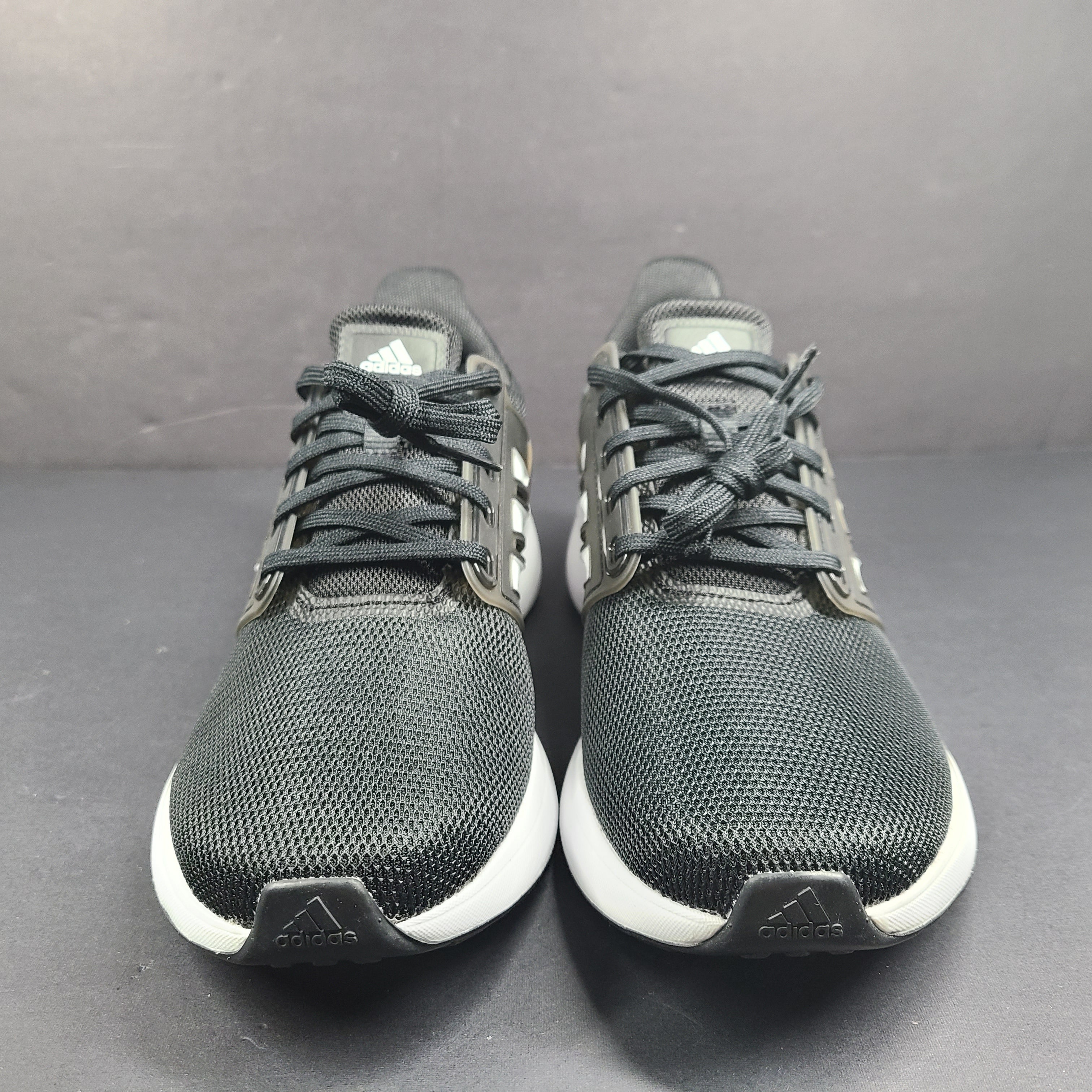 Black Adidas Cloudfoam Comfort men's sneakers in US size 11 with a low-profile athletic design.