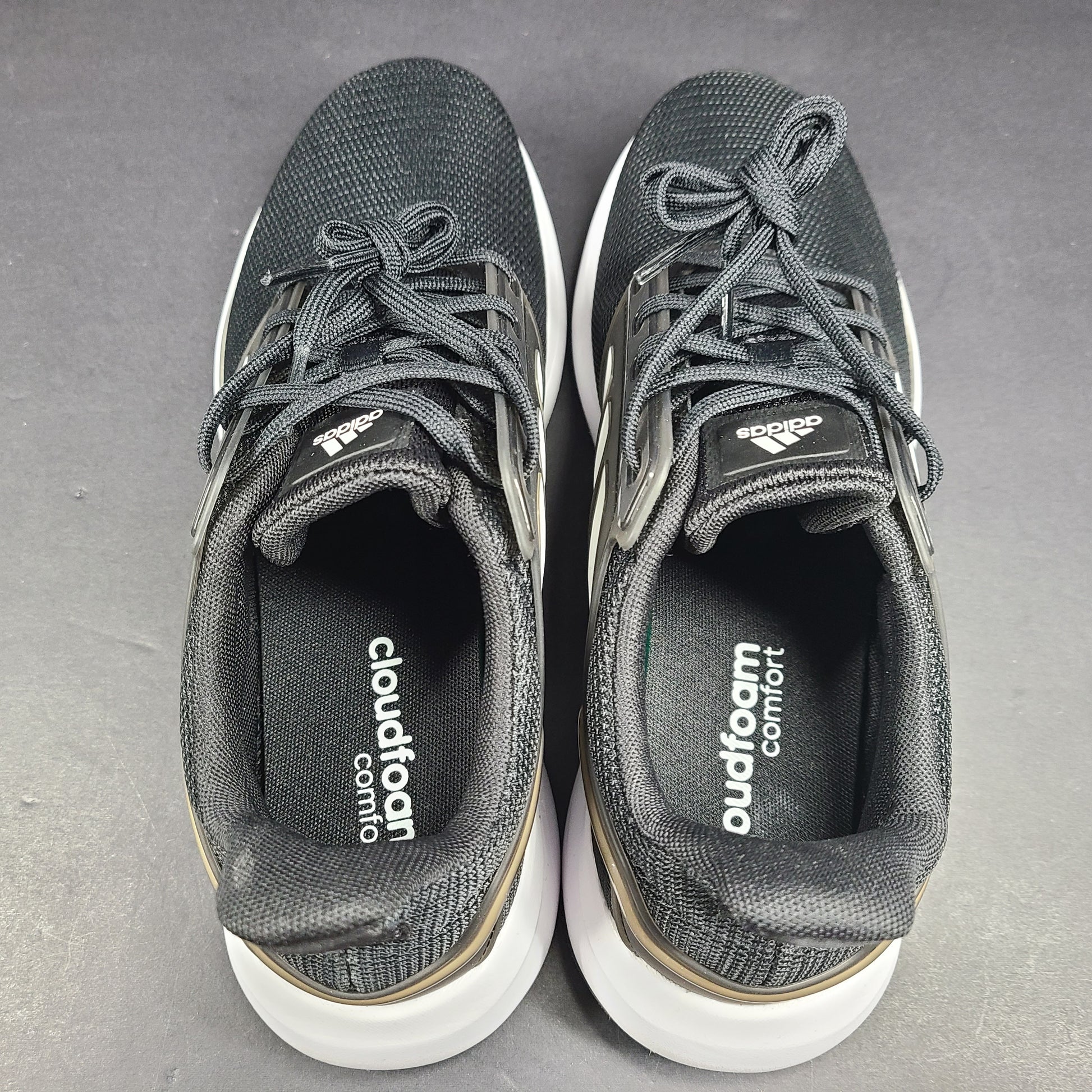 Black Adidas Cloudfoam Comfort men's sneakers in US size 11 with a low-profile athletic design.