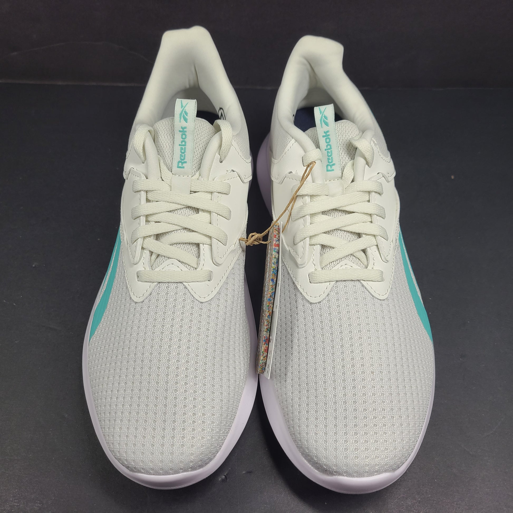 Lightweight Reebok Fluxlite training shoes in gray and teal, US size 9, built for everyday performance.